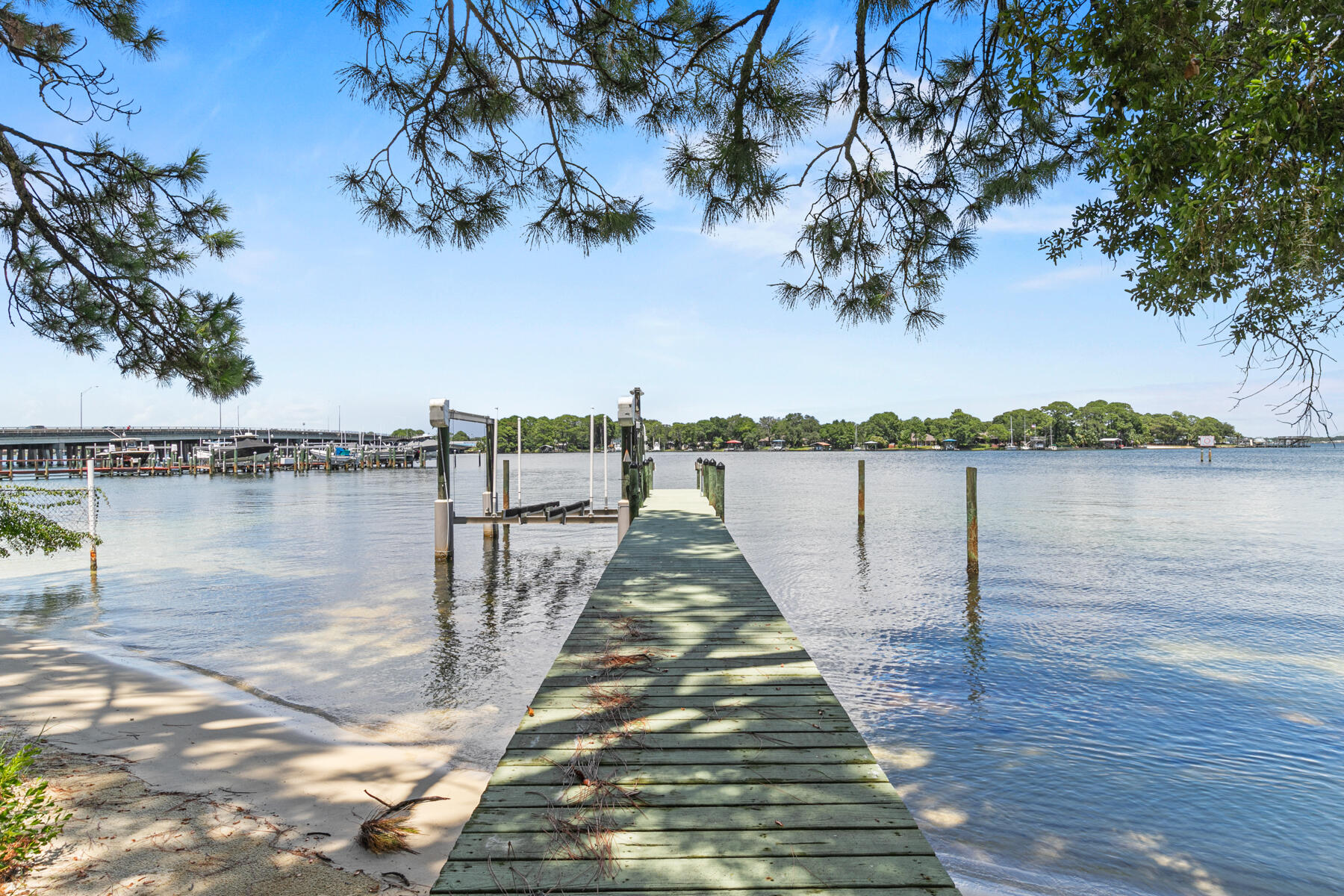 Freshly updated, wonderful WATERFRONT townhome overlooking Cinco Bayou located on Yacht Club Drive in Fort Walton Beach, Florida! NEW flooring, NEW windows, all new paint, and more- make an appointment today to see this spacious three bedroom, three full bathroom unit to see how you can make it your own! Enjoy being able to fish, paddle board, kayak, boat, and more right out your back door! This unit boasts over 2000 square feet and comes deeded with a shared dock with Unit 1 and a private boat slip. The roof was replaced in 2018, water heater 2020, HVAC 2014, and a transferable flood policy is available. Make the bayou life yours today!