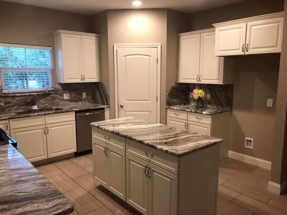 Phenomenal opportunity to own an all brick single story home built in '17, with an approx 1,100 sq ft in-law quarters just added in 2021! You will love the granite counters, the tile flooring and the open spaces! A huge covered & screened patio gives more leisure area to the main house and the connecting in-law quarters has its own screened in patio. Check the photos of this extraordinary home that has a slight waterview of the bay from the front yard, and has a park at the bay, just one block to the West! Two car garage, dimensional shingled roof, undermount sinks, trayed ceilings, modern decor, and much more show the home well! There are 2 - one car garages that are attached to the main house and the in-law quarters! Use one garage for the main house and one...(please click 'More')