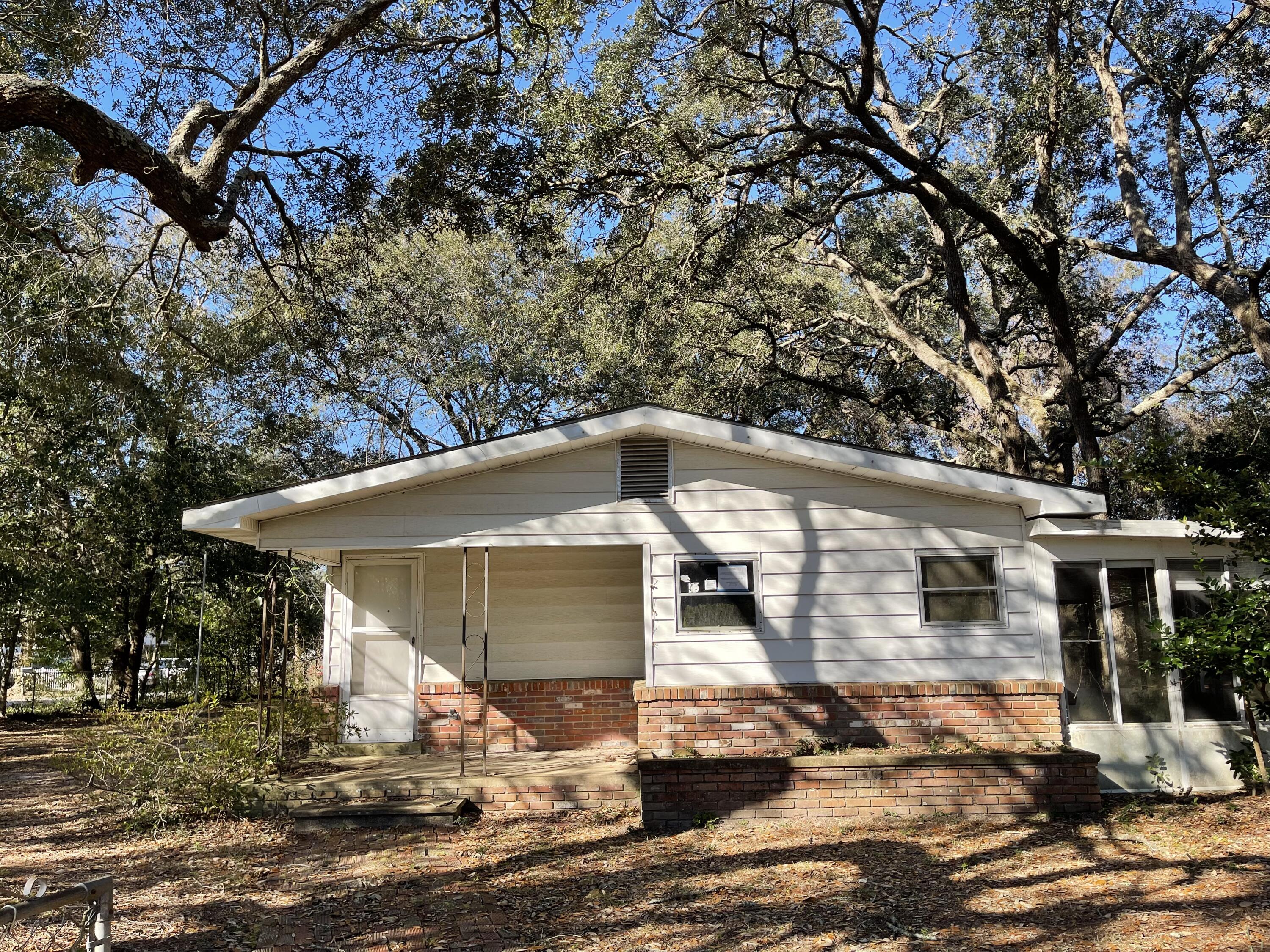 Location is what makes this REO property a definite must see to appreciate! Located on .38 acres in the heart of Niceville, and surrounded by lots of new construction, this MH is one to consider. Built in the 70's, this 1320sf home has 3 bedrooms and 1.5 baths, open kitchen/dining room concept and an attached sunroom. The property is on a larger corner lot and completely fenced in. Due to the age and other mitigating factors, not all financing is available for this particular property. Call today to set up your showing!
