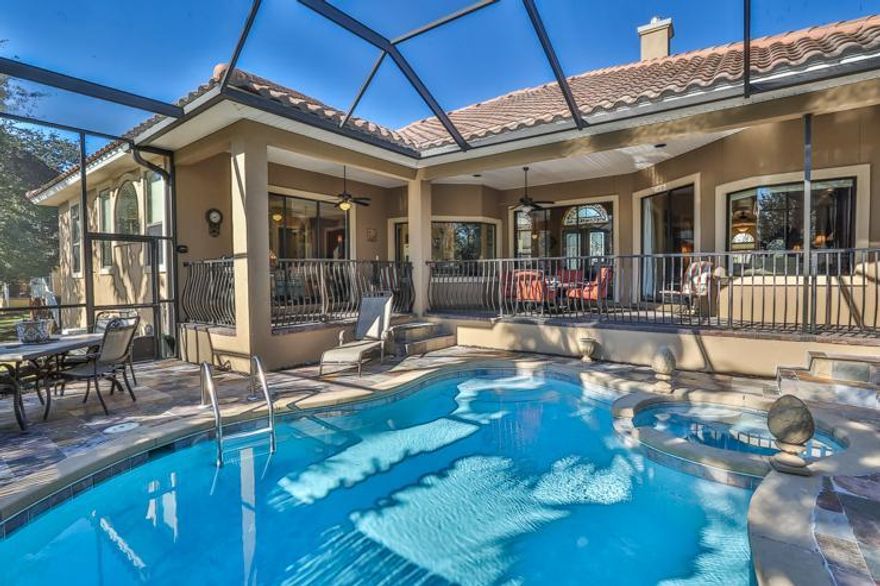 This home is named Loggerhead Bliss and is a luxury 3BR/2.5BA home in the gated community of Destiny East.With a luxurious interior, a private screened-in pool/patio area, and all the Destiny East community amenities, makes this the perfect home.This home offers an open floor plan living area that overlooks the private pool. The living room features seating for six, a fireplace, and a flat screen TV. The formal dining area seats eight, while a breakfast table provides additional seating for four.The kitchen is complete with GE stainless steel appliances, additional sitting/entertainment area with a flat screen TV. Marble floors span the entirety of the open floor plan living area, with custom ceilings and stain-glass windows create luxurious living space.The Master Suite featur