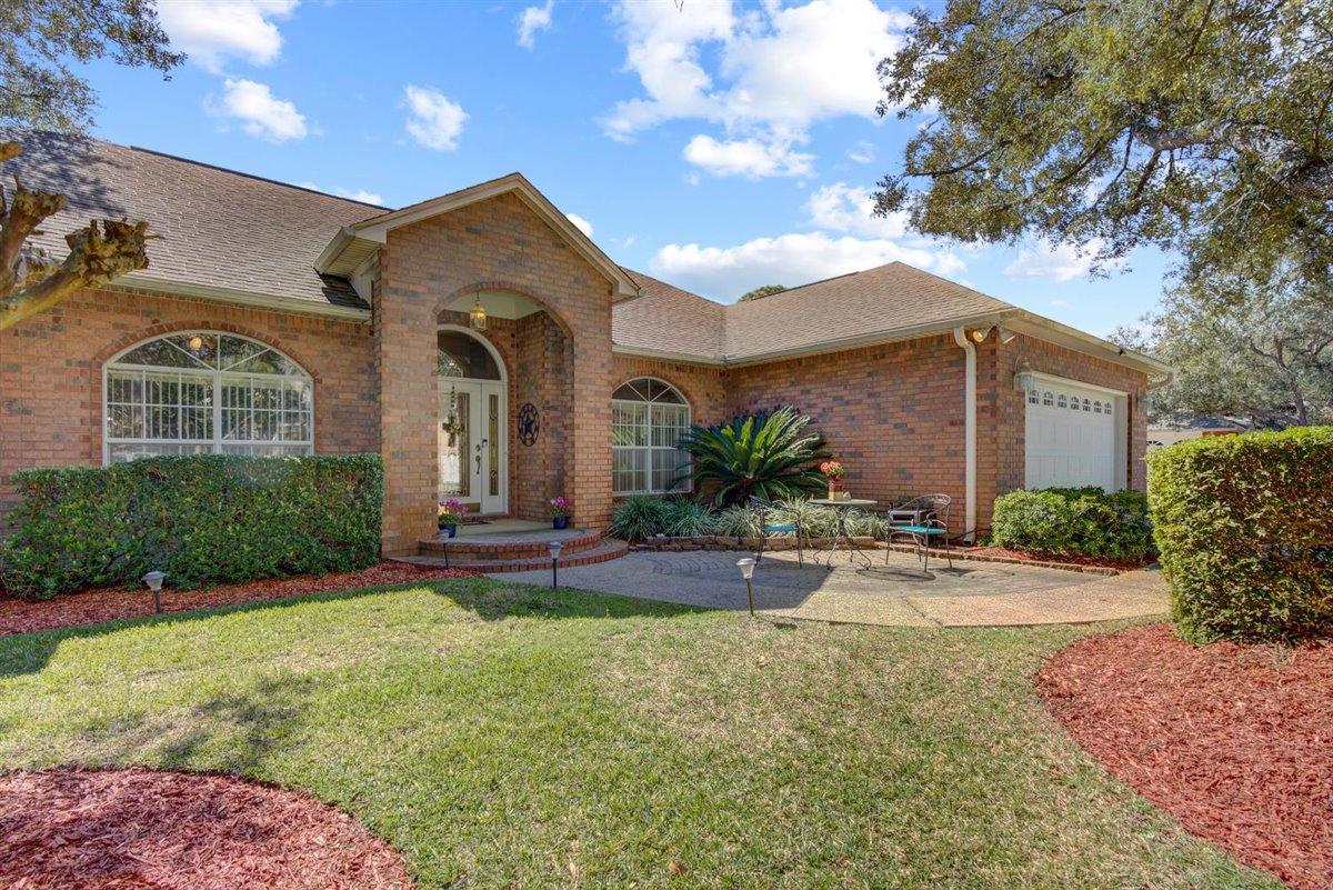 Beautiful home in Southwind community in Bluewater Bay, Niceville. Plenty of space with 4 bedrooms, 3 full baths, large dining room, great room, flex space (for extra dining, office, or den), heated & cooled Florida room, updated kitchen, fireplace, and so much more. Gated community on the golf course. Home has had many updates to include some impact glass windows. This home offers a great location with easy access to Mid-bay bridge and convenient to bases, shopping, beaches, and restaurants. Buyer to verify all deemed important information.