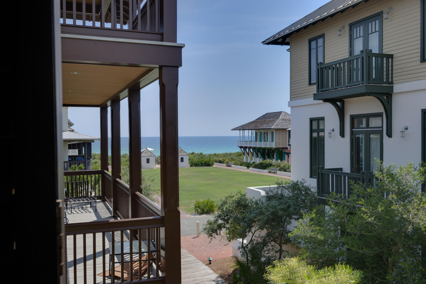 Classic West Indies Charm With Ocean Views! Enjoy a peaceful and tranquil lifestyle from this home located on the boardwalk between the Coquina pool and the Eastern Green. Gulf views and an open floor plan create perfect harmony between indoor and outdoor living. The home boasts hardwood flooring, high ceilings, windows with transoms allowing an abundance of natural light, mahogany doors and accents throughout. The large master suite will take your breath away with its gorgeous built-in cabinetry, vaulted ceilings as well as charming window seats. This home features a large, welcoming covered front porch- the ideal spot for reading a good book or soaking in the sunset, as well as two sleeping porches with hanging beds. Designed by the renowned architectural team of Jorge and Luis Trellis.