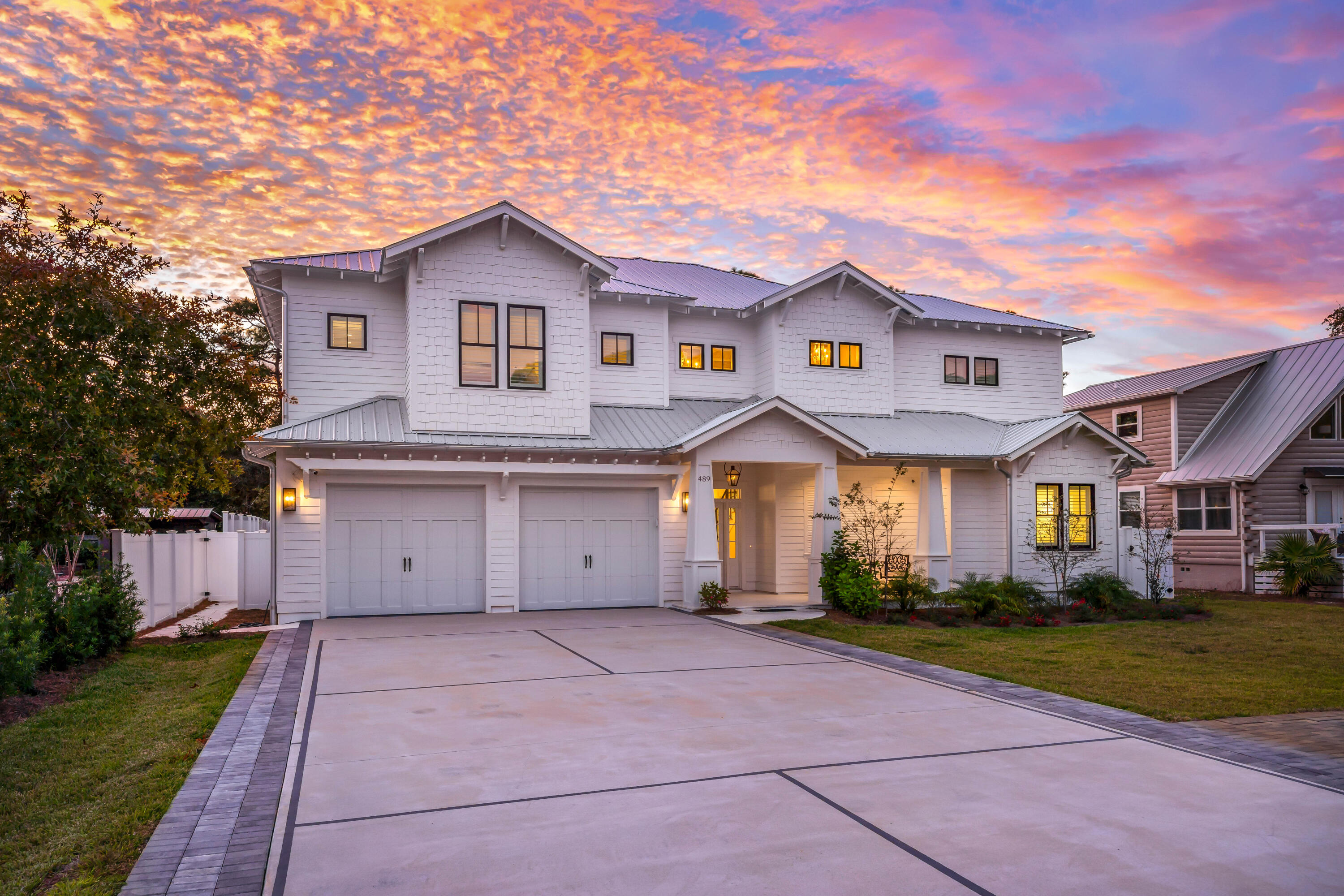 Welcome to 489 Seacrest Drive on 30A, just moments away from Rosemary, Alys Beach and Camp Creek Golf Course. Wonderfully appointed and custom built home has numerous special features above typical homes, Completed in late 2022, this home spans just under 4000 square feet and sits on 0.24 acre with a on-site pickleball court, large 30x10 heated pool, fenced back yard, and plenty of parking for family, friends and guests. Located semi-privately on the north end of the street near the state forest, this newer home could be ideally used as a primary residence, private second home, or income producing vacation rental. Upon entering, you'll immediately notice custom attention to detail with designer touches all around in the flooring, lighting, wall appointments, custom counters, safe room...