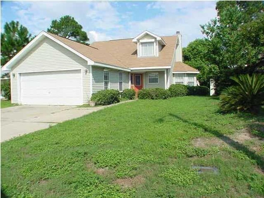 Four-bedroom home in the heart of Destin! This lakefront home needs some updating. The kitchen overlooks the family and dining area making i t great for entertaining. The master bedroom & bath is conveniently located downstairs. Three more bedrooms are located upstairs with another large bath. All measurements to be verified by buyer. Property is being sold ''AS IS''.