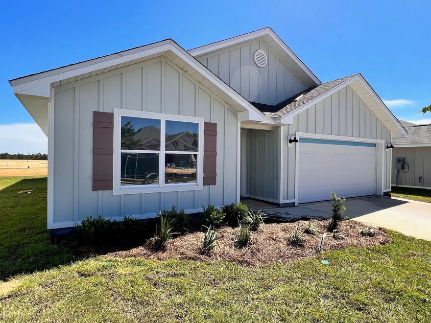 Shoal River Phase 2 Now Open! SOON TO BE COMPLETED!  The Cali is one of our most popular designs featuring 4 bedrooms, 2 baths, a covered back patio and 2-car garage. The kitchen boasts a great open design, making it perfect for entertaining, along with a nice island bar and all stainless-steel appliances. Bedroom 1 is spacious with an adjoining bath that features a walk-in closet, double sink vanity and large shower. Interior features also include beautiful EVP flooring throughout the home with Friese carpet in the bedrooms. The durable Hardie plank exterior makes for a stylish home at an affordable price. The Shoal River Community features sidewalks, underground utilities and a community pool. Perfect for those hot summer days!