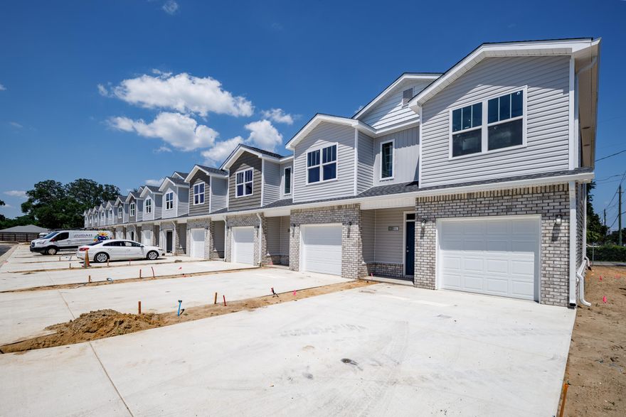 Brand NEW townhomes for sale in the heart of Fort Walton Beach! Orange Place offers 26 units in total, each with 3 bedrooms/ 2.5 bathrooms with an individual garage. This is unit 319-1, which is the first unit on your right, an end corner unit. Downstairs you will find the living room, half bathroom, and a contemporary kitchen complete with Bianco Carrera Quartz countertops, soft close cabinets, and stainless steel appliances including a fingerprint resistant stainless steel side by side refrigerator. You will find LVP throughout the living and bathrooms, and plush carpet for comfort in the bedrooms. You are only a short drive away from the beaches, shopping, restaurants, and more. There is an insurance quote attached for only $130.22/month. Make an appointment to come see one today!