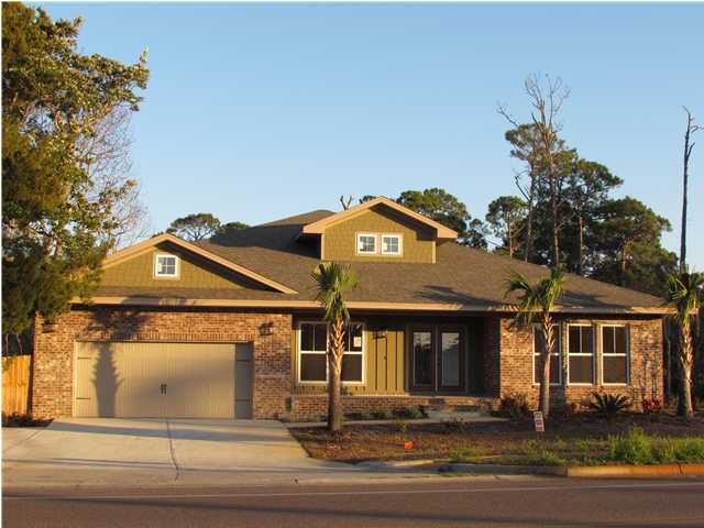 Boat lovers dream! Lift can hold up to a 26 ft. boat. Nearly new waterfront home located on a canal (Good Thing Lake), with direct access to Choctawhatchee Bay. This custom 3/3 home has super curb appeal! The moment you enter this exquisite home, you will fall in love with it's unique design. The main living areas have 9 ft. ceilings, 51/4'' baseboards, impressive crown moulding, and ''Brazilian Hand - Scraped'' hard wood flooring; just to name a few of the extras included in his home. The gourmet kitchen has stainless appliances (including a commercial grade built in refrigerator and freezer), raised panel maple cabinetry, an island, granite countertops, a breakfast bar and a huge pantry. Do you enjoy entertaining? A wet bar is located at the left of the kitchen. Home also has a formal dining/ living room, a breakfast nook, an oversized waterfront greatroom w/ rope lighting above the crown moulding, and a large covered porch. The waterfront master suite is awesome! It is oversized, has a trayed ceiling, 2 large walk - in closets, a bath with separate shower, a whirlpool tub, double vanity and linen closet. Impact glass is installed in the home, which will reduce the rate of insurance. Home has a Taexx, ''in the wall'' pest control system, that is serviced from the exterior of the home, for the owner's convenience. Do you enjoy tennis? The city tennis courts are located across the street. The rear yard is large enough for a pool. Yard comes complete w/ tropical landscaping, a sprinkler system, well, pump, and timer. The dock permit is applied for. Please keep this home at the top of your list, you will not be disappointed. Listing Broker/Salesperson has ownership interest in the property.