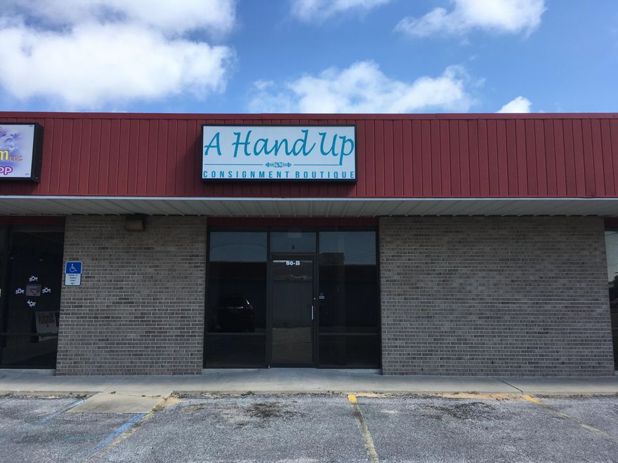 Located just South of the corner of Yacht Club Drive and Beal Parkway. This office or retail space is improved with two offices off of a large open area.