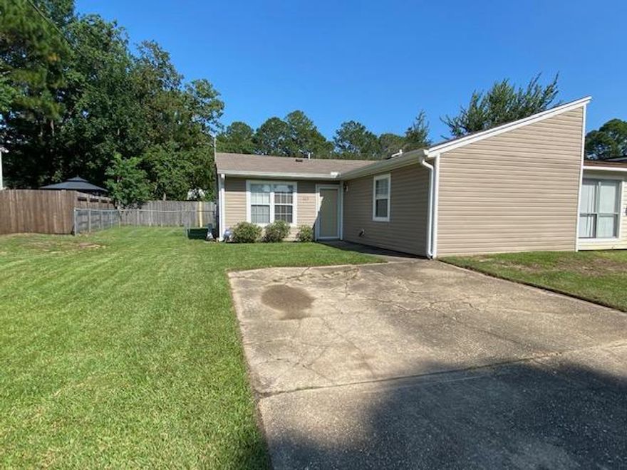 Move- IN Ready - END UNIT, 2/2 Vinyl Townhome with Private Yard and 4 Parking Spaces!  Open Floor plan - Large Living room/Dining that open to the Kitchen. Great Location  - close to Beaches, Bases and Shopping!  NEST Programmable Thermostat!  All Tile Flooring (NO CARPET!) Fresh Paint, Lighting and Fixtures Throughout!  Kitchen has a Large Breakfast Bar and newer appliances including Refrigerator with Ice Maker, a Dishwasher and a Glass top Range with Self-Cleaning Oven!  There is a Built in Microwave which leaves plenty of extra countertop space.  Each Bedroom has a Double Closet and a Private, Full Bath. Both Baths have been nicely updated.  Outside, there is a Screened Porch, Laundry room with storage and a Large, fenced Back Yard.  There is No Homeowners Association. Home is sold as-is except for lender required repairs. Shed hold no value for appraisal purposes.