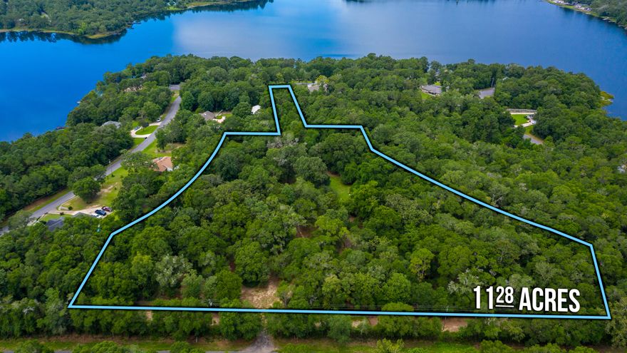 The opportunities are endless with this 11 plus acre estate! The location is phenomenal- 780 ft on Hwy 331, frontage also on Lake Holley Circle and 3 sides of the property are surrounded by an estate style subdivision of homes. The 1958 Florida Cottage is well maintained. The home features original hardwood floors, a breakfast bar and has been updated through the years. The metal roof is 10-12 years old and electrical was redone in 2017. This home is being sold AS IS but seller's are not aware of any problems with this home. The yard is one of the prettiest in the area with beautiful oaks and magnolias, camellias, azaleas, crepe myrtles, tea olives, satsuma tree, blueberry bushes plus much more. Don't let this opportunity pass you by!
