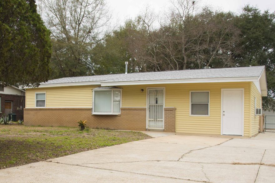 REDUCED PRICE! Cute home in mid town Fort Walton Beach. 3 bedrooms and 1 bathroom with large bonus room off laundry that would make a great office/library. All new ceramic tile and paint. Over-sized parking and over-sized detached garage/workshop in back. Garage door is hurricane rated. Privacy fenced on two sides and chain link fence on back. House has COPPER wiring according to owner. Hot Water heater new in 2014. Roof on home and garage new in 2014.Double pane windows and all new baseboards. 2 wells on property. House has gas hot water, heat and stove. All information is believed to be correct but should be verified.