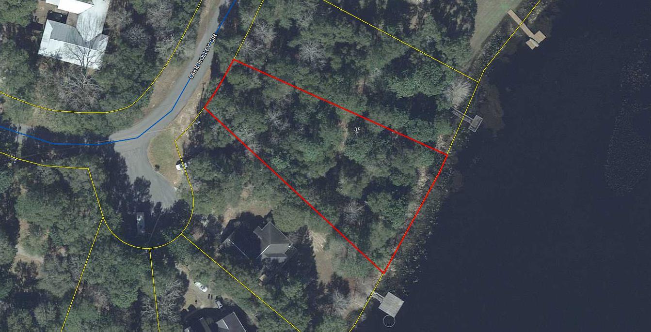 Lot 31 on Lake Holley Circle will make a beautiful location for that dream home on the water. Holley Lake is appx. 400+ acres with bream, large-mouth bass, catfish and crappie and is an exclusive waterfront community with restrictions. See under ''Documents'' for a copy of the plat, lot and restrictions and amended restrictions. Minimum building size is 1200 s.f. No mobile homes allowed.