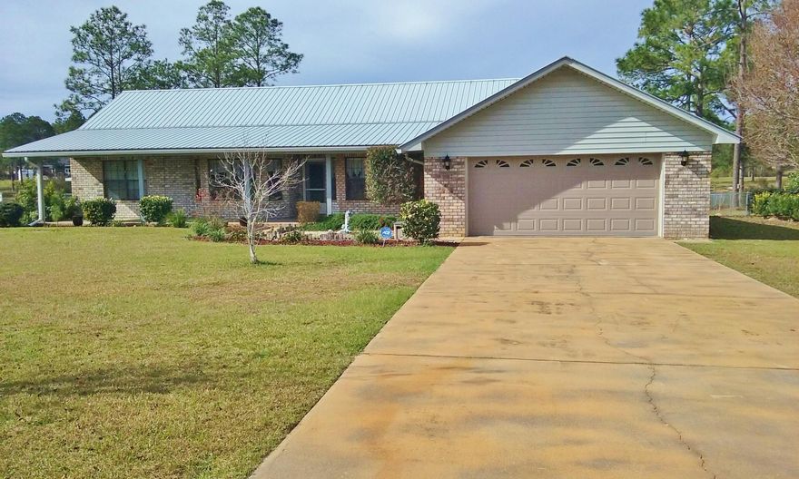 Home is under first right of refusal. Can be shown and bring offer. Call for details. Waterfront home with a dock! The Ten Lake area is within 30+/- minutes to the sugar white beaches of the Emerald Coast. Move-in-ready home (everything stays) if you choose. Some of the wonderful features include an eat-in kitchen with breakfast bar, solid surface countertop, breakfast room, hardwood flooring, formal dining room, laundry room, wood burning fireplace, metal roof, and fenced-in back yard. The over-sized family room has an entire view of the lake with a nice attached deck. You will appreciate the master bedroom as it has a walk-in closet, private screened porch with lake views, whirlpool tub, separate shower, and double vanity.Furnishings and most items stay including whole house generator.