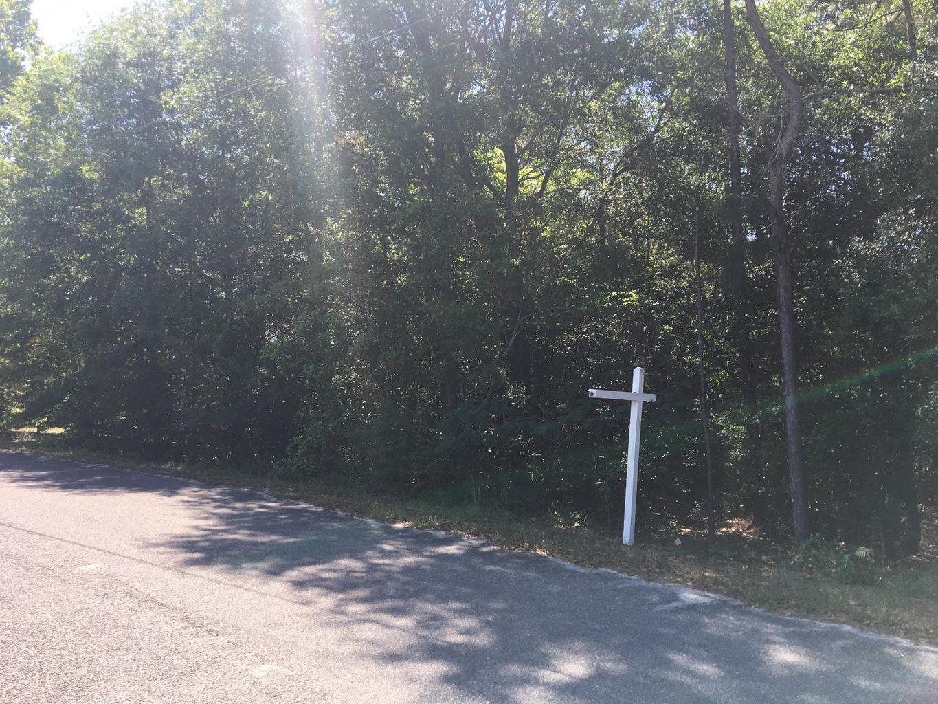 Great lot to build on. Backs up to water. 1.3 acres on paved Rd with utility access.