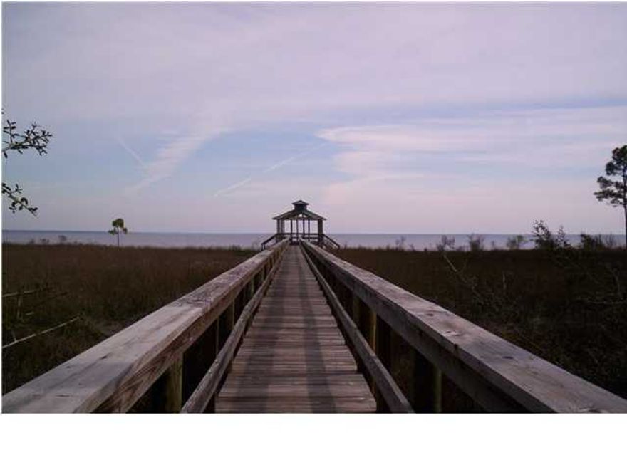 Drastic price reduction. Seller needs to close by 12/31/2019. Double lots to build your dream home on nearly an acre of land at the entrance to Sea Pines on Garcon Point.A stone's throw to updated public boat launch and boardwalk area located at the end of Grey Heron Dr. Sewer is available; septic systems are not allowed. Lot is a part of Sea Pines; HOA $350 per year, Homeowners' amenities include beach, dock, pavilion and gazebo. Buyer to verify all data. Parcel ID#s: 25-1S-28-4914-00A00-0110 And 25-1S-28-4914-00A00-0120