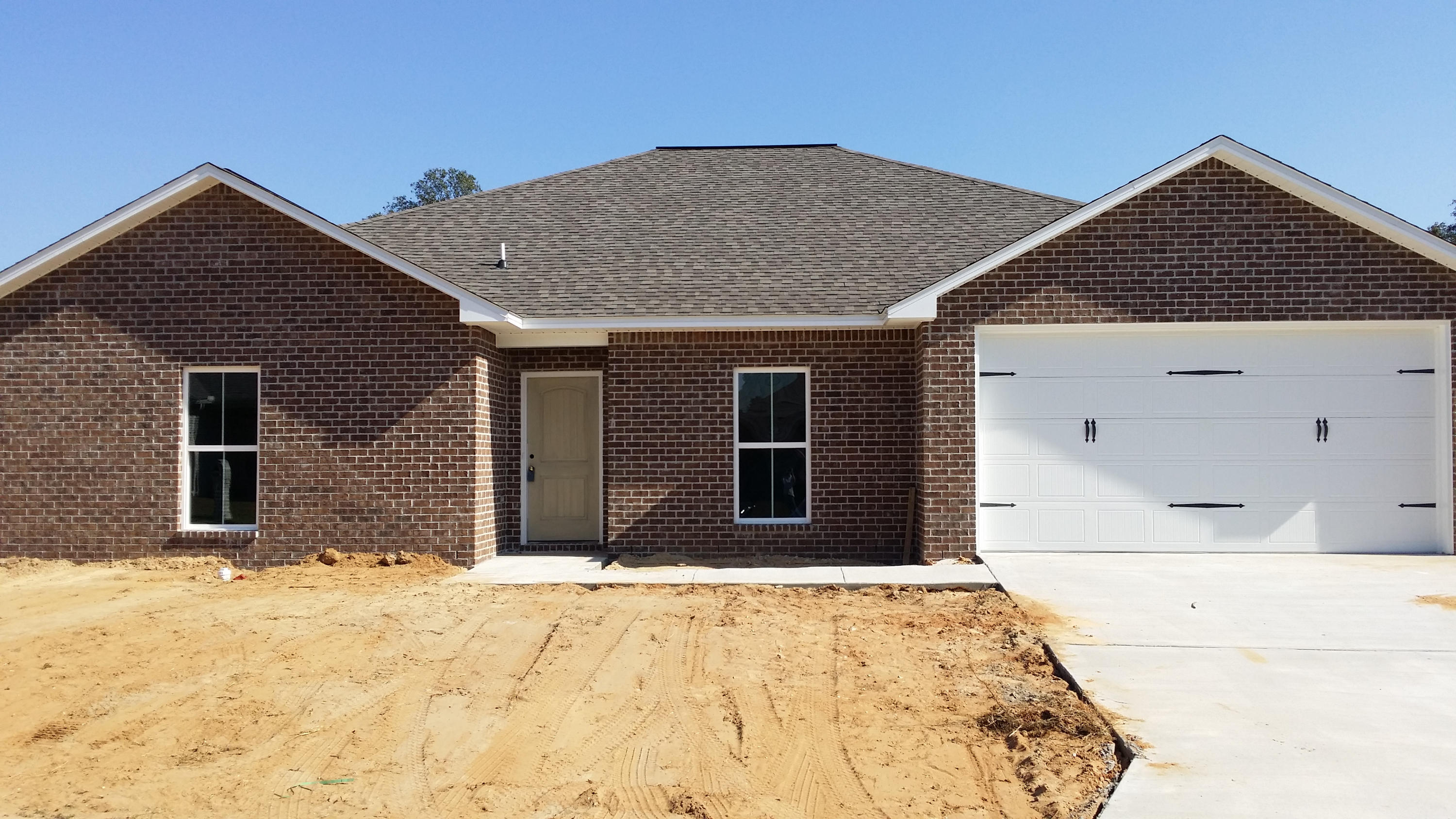 Come see this four bedroom/ three bath floor plan on a level lot in Duggan Pond--SOUTH CRESTVIEW. This all brick house has 9 foot ceilings in the main living area, porcelain tile in the wet areas with low-pile carpeting in the bedrooms and living room. Stainless steel appliances in the kitchen include microwave, dishwasher and smooth cooktop stove/oven. Granite is found in kitchen and bathrooms. The master bath has a large 3x5' shower and a large separate soaking tub. It also has a separate water closet along with a large walk-in closet and an additional standard sized closet. Many upgrades in this house. Yard fully sodded. Builder offers to pay all closing costs (except VA funding fee, prepaids, and discount points) if using a preferred lender. Buyer to verify all data deemed important.