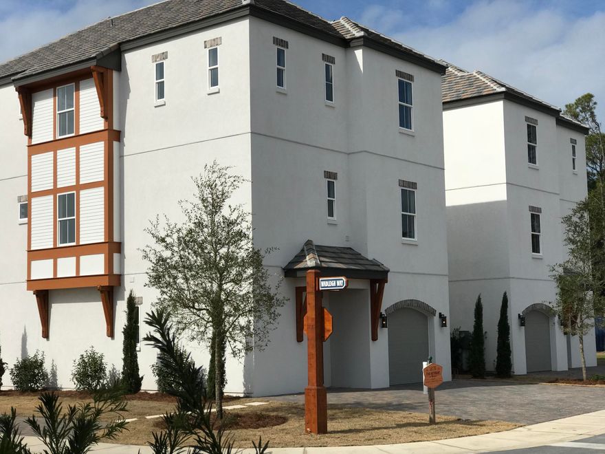 This is a brand new Beachside development in Miramar. Tons of upgrades, 66'' fridge/freezer , custom tile, hardwood floors and ceiling. Beautiful community pool and fully stocked fishing pond. This community is golf cart and rental friendly. These homes are a great investment. Have several rental projections.