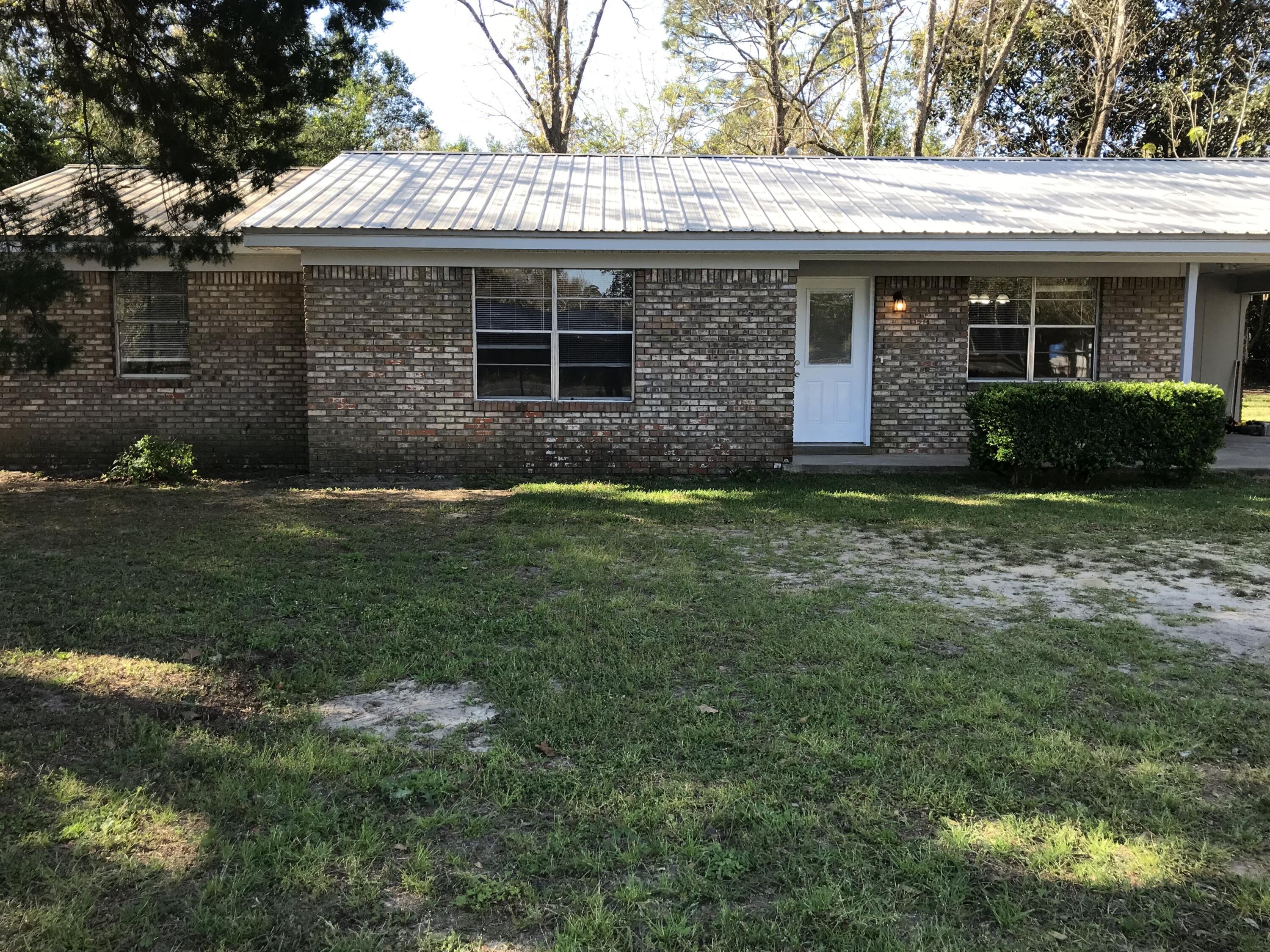 Easy access to the local military bases. Located about 5 minutes from Crestview. Very well maintained 3 bed room 2 bath home on spacious lot. New flooring thru out the house. Large utility room just off the cozy kitchen dining area. Master bath features marble shower and solid service counter top. Don't miss out on this one.