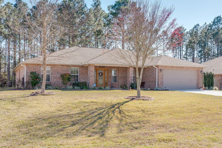 The beautiful home you've been waiting for has finally arrived.  4 bedroom 2 bath nestled in the Holley by the Sea neighborhood.  All brick construction with tons of curb appeal.  As you enter the home, you will find an office and formal dining room on your left and right respectively.  Walk forward and enter your spacious living room with cathedral ceilings.  To your right you will find a breakfast nook and beautiful kitchen.  Kitchen includes granite countertops and stainless steel appliances.  Master bedroom features glass doors out to your large screened in back patio.  Master bath includes walk in closet, double vanity, walk in tile shower, and soaking tub.  Second bathroom has alternate door to screened in patio.  Back yard is beautifully landscaped.  Home has been converted... from septic to sewer, buyer could add a pool for hot summer days.  Custom curbs around trees and flower beds, small storage building conveys.  Yard also features grapes, peach tree, orange tree, and netted garden.  Thermo-Blanket insulation added in attic to reduce power bill.  Holley by the Sea HOA provides an incredible recreation center with full gym indoor and outdoor pools, top of the line tennis courts, children's daycare, a variety of classes, dock area to the sound, private boat launch to the bay, RV rental area, basketball courts, playground, and much more.  Stop by and fall in love with this home while it lasts.