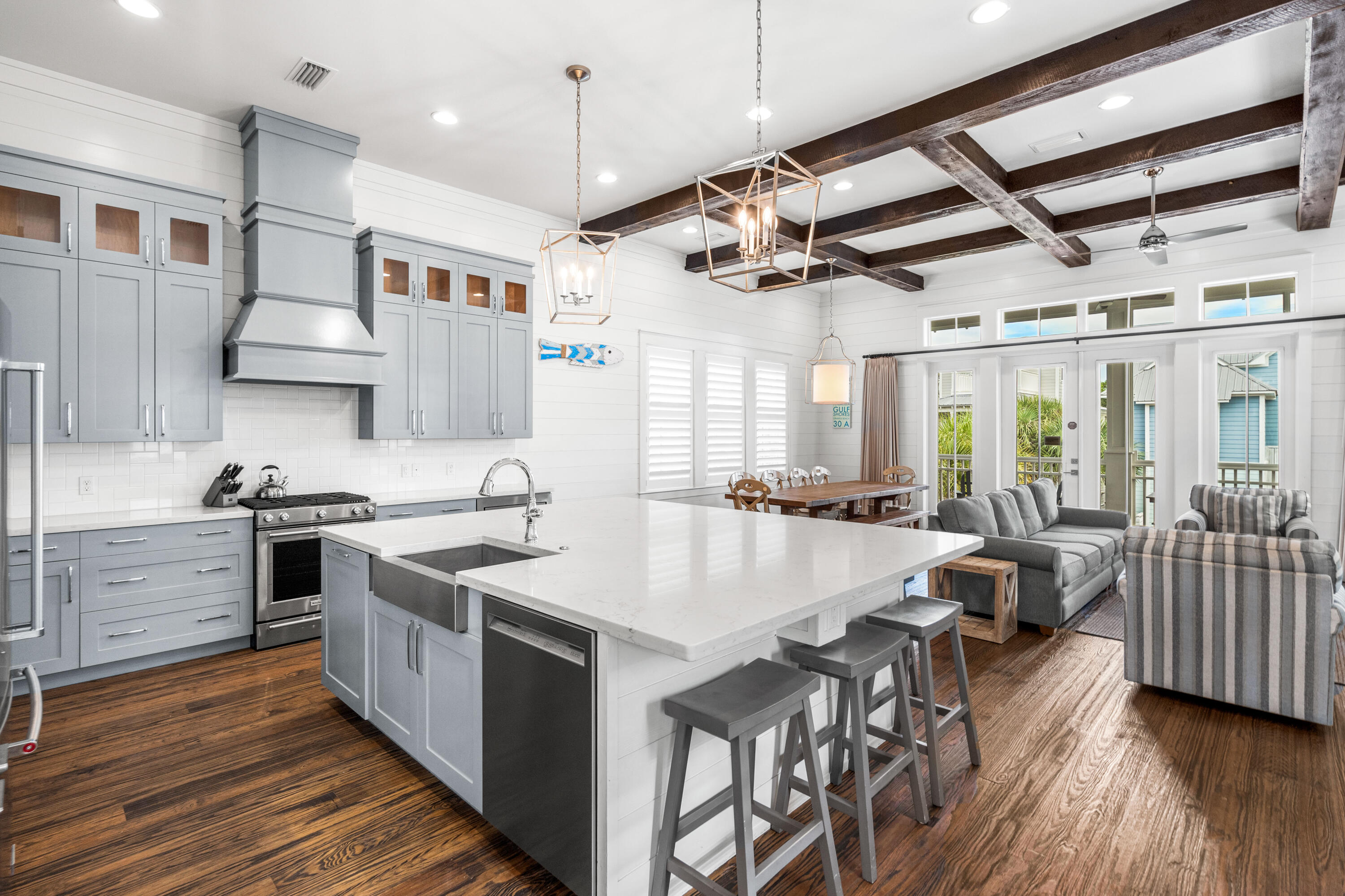 Experience the essence of coastal living at 28 E Endless Summer Way, nestled in the vibrant community of Seacrest Beach, one of the most sought-after destinations along Florida's scenic 30A. This splendid 4-bedroom home showcases the very best of beach living.As you enter, you're greeted by an inviting open floor plan that seamlessly merges the living, dining, and kitchen areas. This layout is perfect for entertaining friends and family, providing ample space for creating cherished memories.Two expansive covered porches, one at the front and another at the back, invite you to relax and soak in the coastal breeze. The outdoor space is an entertainer's dream, boasting a built-in grill and sink for alfresco dining and culinary delights.Luxury and comfort define this home, featuring not one, but two oversized primary bedrooms, offering private retreats where you can unwind in style.
The heart of the home, the designer kitchen, boasts quartz countertops, stainless steel appliances, and a generously sized island that seats up to 7. Whether you're preparing gourmet meals or enjoying casual dining, this kitchen is sure to delight.
The living room exudes warmth with its gas fireplace and charming wood beams, creating a cozy and welcoming atmosphere for relaxation.
Located in the heart of Seacrest Beach, residents have access to the area's largest 12,000 square foot resort-style lagoon pool, providing endless enjoyment in the Florida sun.
This beachfront haven at 28 E Endless Summer Way offers a harmonious blend of luxury and coastal charm, making it an ideal year-round residence or an exceptional investment opportunity.
Don't let this opportunity pass you by. Schedule an exclusive showing and immerse yourself in the coastal lifestyle you've been dreaming of.