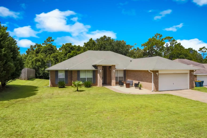 Located on a quiet cul-de-sac street in South Crestview with: Home Warranty, Stainless appliances, Barn Doors, Laminate wood flooring throughout, and 2,560 sq.ft. Split Bedroom plan with 4 Bedrooms, 2 Bathrooms, Eat in Kitchen, Formal Dining Room, and an Office/Den/Flex Space! Living Room has a corner fireplace and vaulted ceiling. Master Suite is located off the Living Room and has a Master Bath with two walk-in-closets, dual vanities, separate shower, and soaker tub! Additional Bedrooms are located on the other side of the home and share the 2nd Full Bathroom. Enjoy the outdoors and your wooded view on the back deck. Kitchen has plenty of cabinet and counter space, breakfast bar and a pantry! Schedule your showing today!