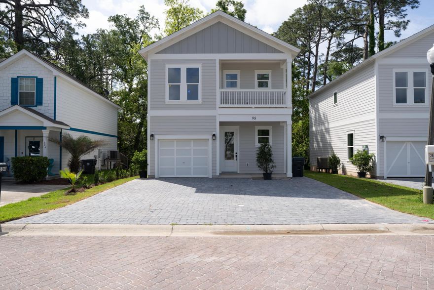 Welcome to this brand-new, beautifully designed 3-bedroom + den, 2.5-bathroom home located in a picturesque subdivision featuring paver-lined roads and exclusive private dock access to the water. Built in 2025, this home combines thoughtful layout, modern style, and high-end finishes in every room.Step into a bright and spacious open-concept living area with a stunning kitchen that boasts upscale cabinetry, luxurious countertops, and top-of-the-line stainless steel appliances--perfect for both everyday cooking and entertaining. The bathrooms feature elegant updated finishes providing a spa-like retreat at home.