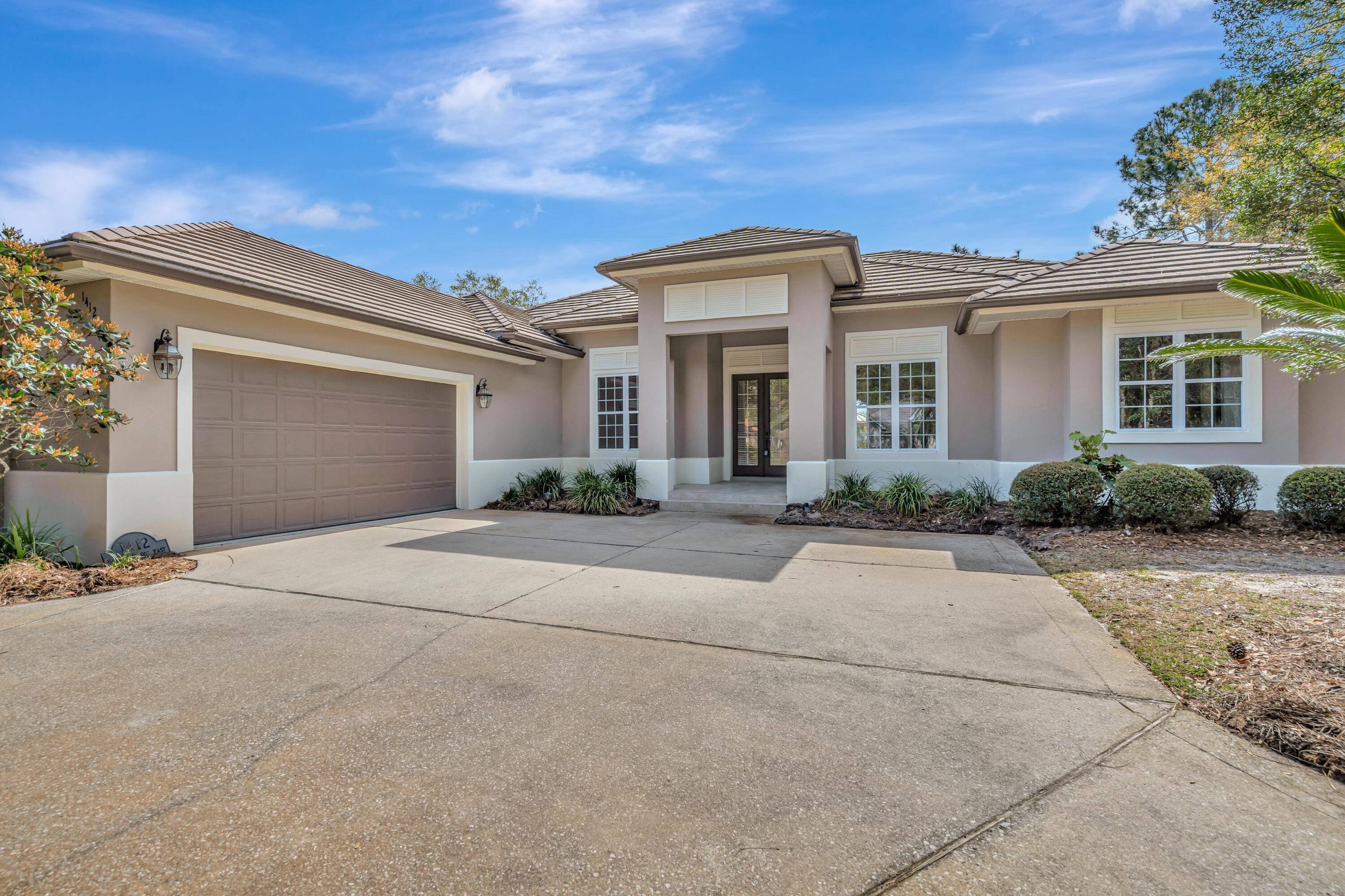 MOTIVATED SELLER! This 4 bedroom, 3 bathroom contemporary home is 2,694 sq. ft. and sits on an exceptional half acre lot; one of the largest in Baytowne. Enjoy the open floorplan with high ceilings and large windows with natural light exposure throughout. The kitchen is the heart of the home, complete with new matching stainless steel appliances, granite countertops and island, plenty of storage, and more. This home offers sizable bedrooms, the additional fourth room that can also be used as office space, an oversized garage -just to name a few. Paradise is a short golf cart ride to the gorgeous emerald coast beaches, shopping, entertainment in the Villages that include family attractions and local events. Don't miss out on this opportunity to own within the resort!