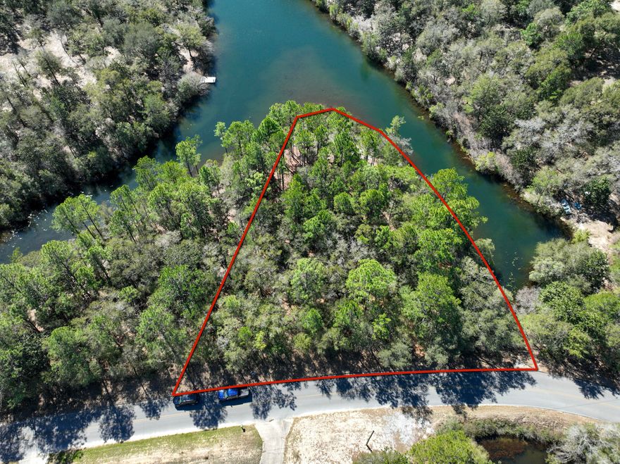 Hurry and make your offer today! Lakefront Lot in beautiful Defuniak Springs. You must see this property to appreciate the natural surroundings and nature. Build your dream home away from all the congestion or hold as a tremendous upside investment. Two different parcels for sale but you can combine as one. Seller does not want to divide lots so please respect that. The list price of $110k is for both lots.  Please see MLS 974357 for the other listing. The land is on two different parcels. Both parcels convey!