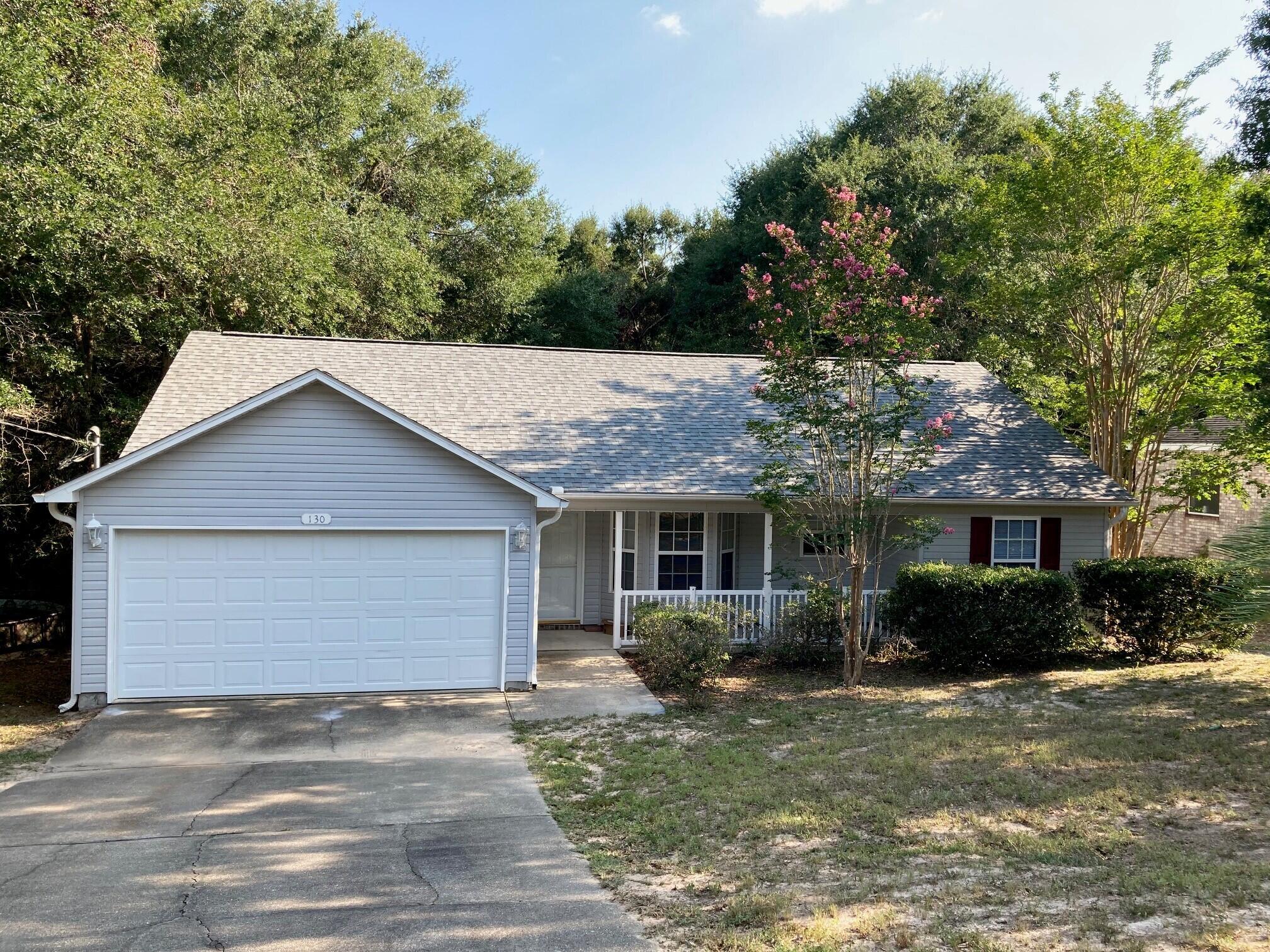 Very nice 3bed/2bath split design with a large covered deck off the sliding glass door. Gorgeous kitchen with granite countertops and bar. Master bedroom with large walk-in closet and bathroom. Large fenced in backyard. Stainless steel appliances including newer dishwasher. AC was replaced 2 years ago. Brand new flooring throughout living room and brand new tile in bathrooms and utility room. Large, nice front porch and 2 car garage. Come see this rental today!