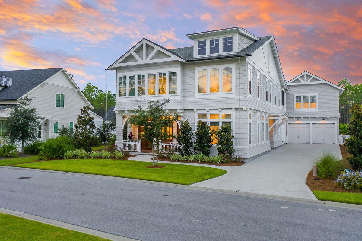 Masterfully Designed Southampton Inspired Home with Outdoor Oasis.Meticulously maintained and expertly crafted, the one-of-a-kind Nantucket-inspired retreat at 55 Seastone Court embodies the pinnacle of design and craftsmanship within the WaterSound Origins community. Masterfully designed by Chris Stoyles, this purely custom 4,625-sq.-ft. single-family residence on a premiere estate lot offers refreshingly creative interiors, hand-chosen finishes and architectural elements rarely seen in the popular family-focused community. Spanning across a two-story main house and a one-bedroom carriage house, five bedrooms are offered in total, as well as multiple living and entertainment areas, perfect for multigenerational living or simply those craving the rarity of space along the coast.