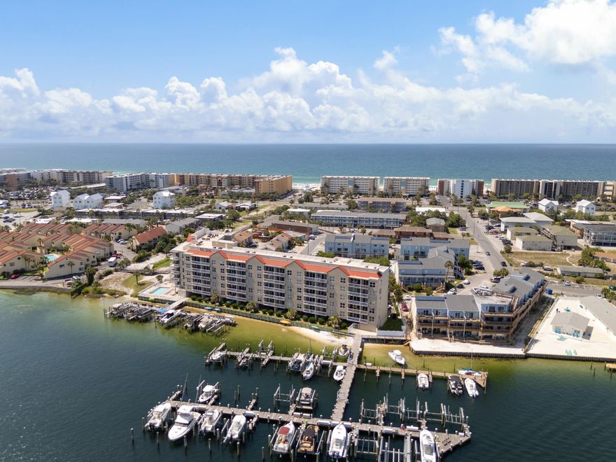 This beautifully updated 2-bedroom, 2-bath condo makes for the ultimate coastal lifestyle--perfect as a primary residence, second home, or short-term rental. Located directly on the Intra-Coastal Waterway, this condo boasts stunning waterfront views and comes with a deeded, deep water boat slip that can accommodate a 25' by 14' vessel in a no-wake zone--a true dream for boating enthusiasts. Inside, the condo features modern upgrades throughout, including new LVP flooring, granite countertops, and updated bathrooms. The layout flows seamlessly into the living area and private balcony--ideal for enjoying the gorgeous waterfront view, sunsets, and the vibrant boating scene and beautiful wild life, from the privacy of your home. This gated community offers a heated waterfront pool, hot tub, grilling area, and covered owner parking, with an assigned parking space, along with guest parking. Residents also enjoy a boardwalk to the beach access, adjacent to the community, making it effortless to enjoy the white sands and emerald waters of the Gulf, less than a two minute stroll away. Within close proximity to the property, you'll find popular local dining favorites such as The Gulf, AJ's Oyster Shanty, and Old Bay Steamer, along with shopping and entertainment options for all ages on Okaloosa Island, and downtown Fort Walton Beach. This unit is move-in or rental-ready immediatelythis is an exceptional opportunity to own a piece of paradise on the Emerald Coast. Schedule your showing today! 