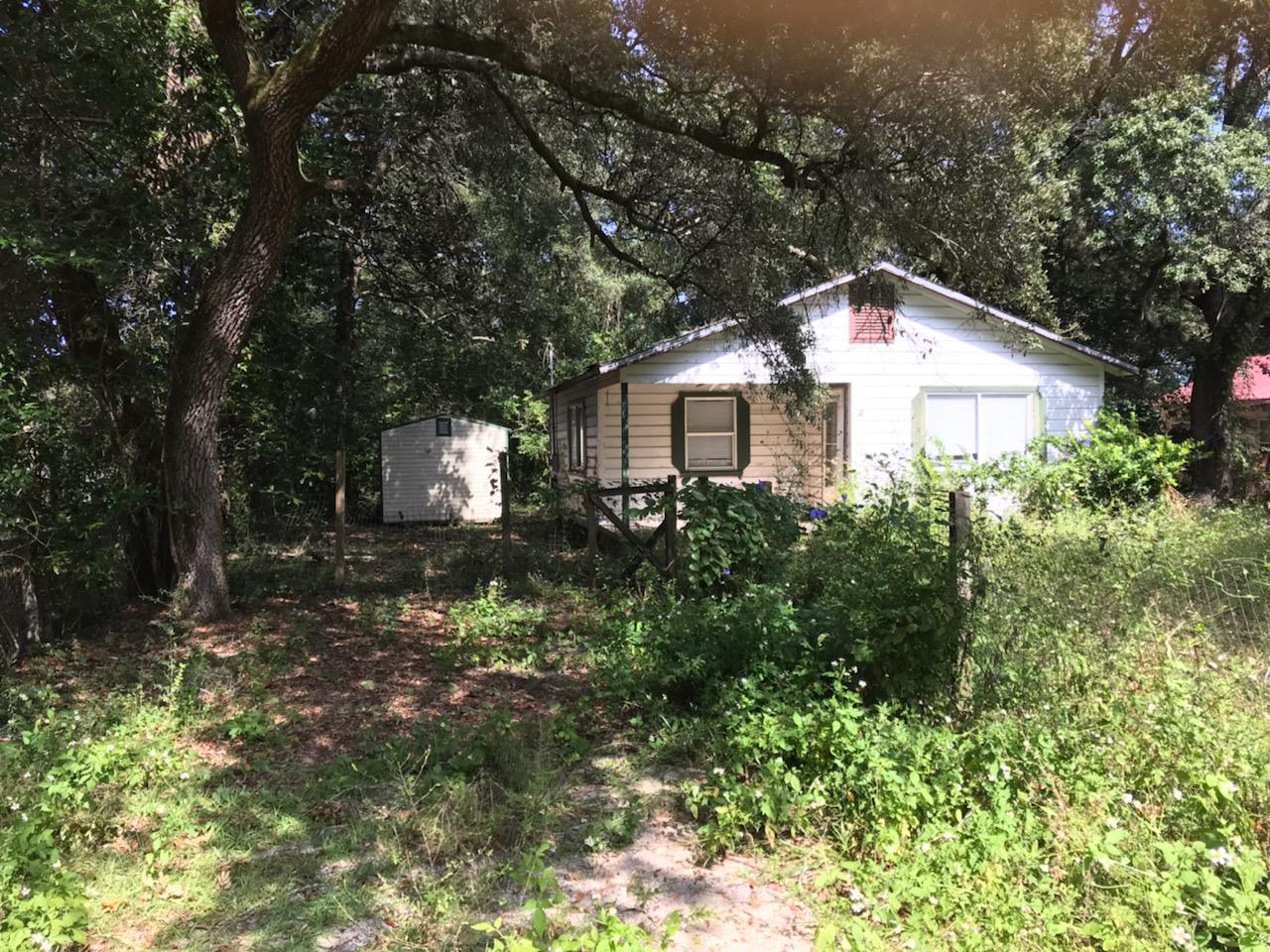 This home is a tear down. Price is for lot only. Great area in Niceville. Buy and build your new home.