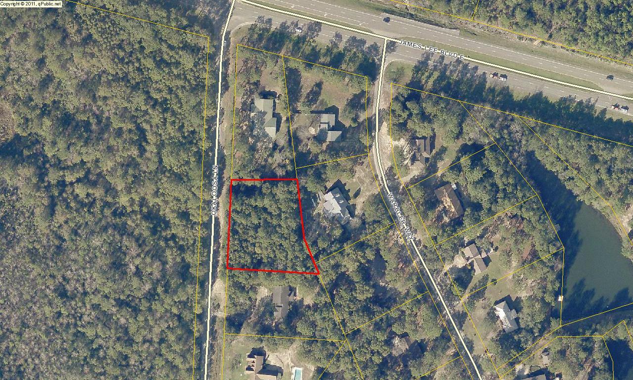 WOODED ONE ACRE LOT, CLOSE TO TOWN, COUNTY ZONING WITH CITY CONVENIENCE,NICE HOMES IN THE AREA!