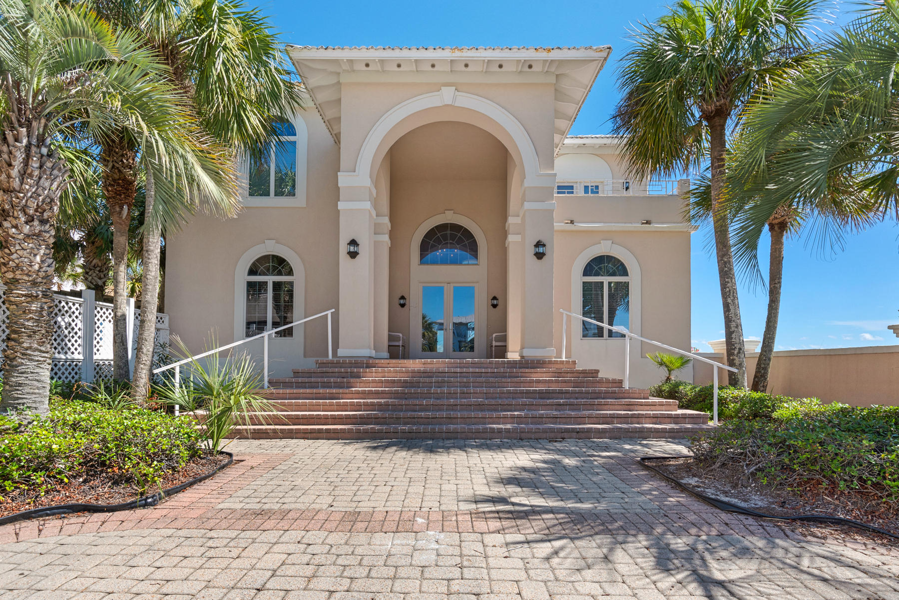 Welcome to Crystal Paradise, One of the areas top income producers. You will be captivated by the views of the Emerald Green waters from the moment you enter the impressive grand foyer. First floor living, area with an open kitchen and dining area. looking out at the gulf. Two additional guest suites with ensuite baths a full size laundry room with tons of storage. Gulf facing pool and covered porches just outside the door. The second floor boast an expansive master suite and bath with and additional living area, half bath, built in bunk area. Additionally there is an elevator for owners use. The guest house offers a full kitchen, dining, and one master bedroom. An abundance of parking along with two 2 car garages make this an incredible second home or vacation rental.