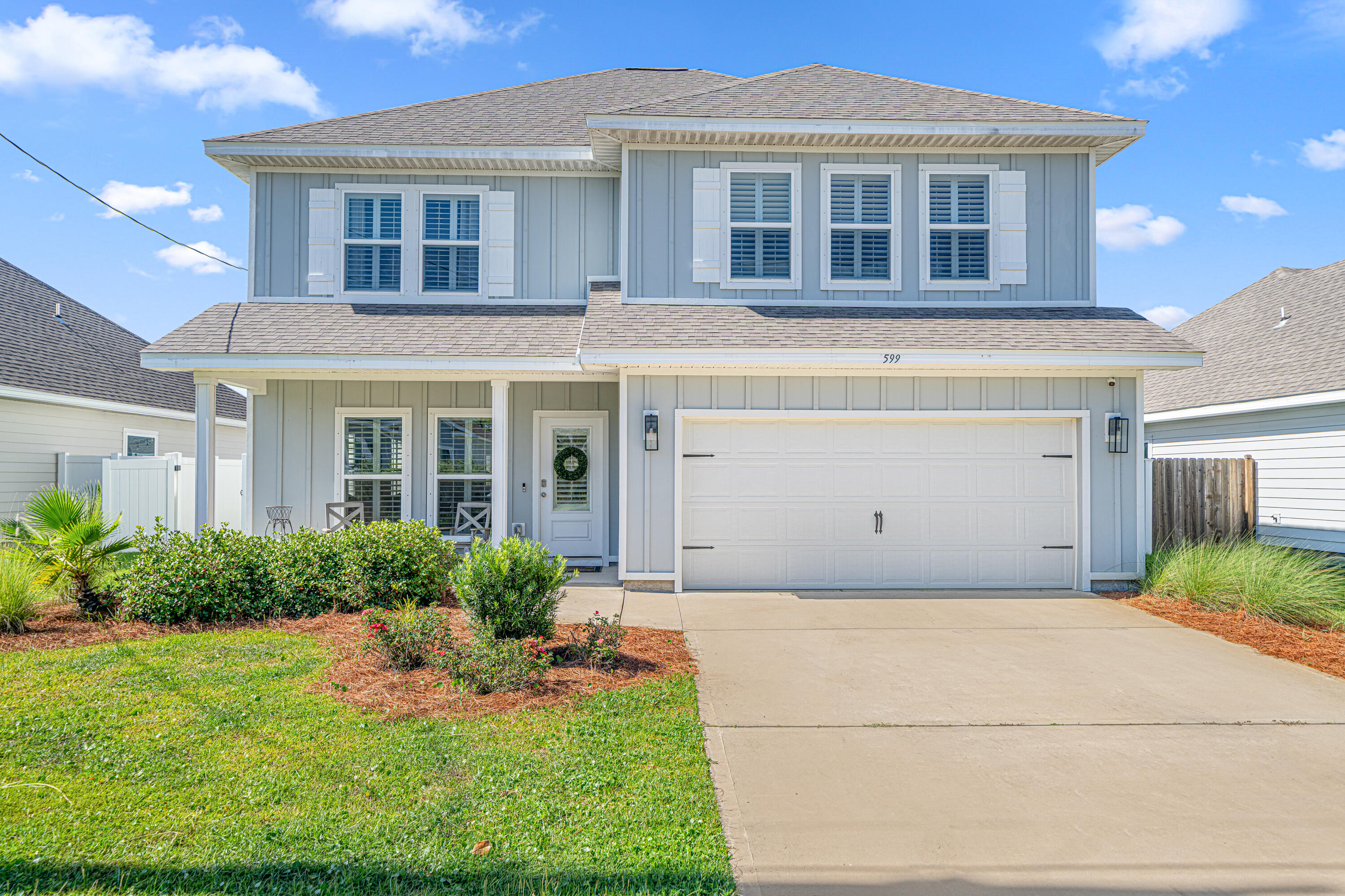 $10,000 Seller Credit! Bay Access, Huge Fenced Backyard, Lake View, Close to Grand Boulevard, Beaches, & Top Rated Schools. Enjoy the magic of the Emerald Coast in Treasure Trove, where neighbors know your name, kids play together in front yards, and life moves just a little slower. This charming 4 bedroom + bonus room has a huge backyard with space for a pool, stunning sunsets, and plenty of room to play. Enjoy Florida living on the large brick paver patio or covered back porch. Inside, the home features a bright, open layout with neutral LVP flooring and plantation shutters throughout for easy maintenance and timeless southern style. The kitchen is the heart of the home, featuring a big island with quartz countertops, stainless-steel appliances, pantry, and beautiful cabinetry. A sunny dining area just off the kitchen offers the perfect spot to enjoy your morning coffee or family dinners. The living area is warm and inviting, with space to relax, host guests, or unwind with a good book.
The first-floor master bedroom offers a relaxing escape with a walk-in closet, lake views, and a spa-like en suite with a double vanity and tiled shower. Upstairs, a large bonus room provides flexibility for a second living space, playroom, or home gym. There are three generously-sized guest bedrooms with walk-in closets. Two bedrooms share a Jack-and-Jill bathroom with large vanity and shower/tub combo and a third guest bedroom has access to a full bath in the hallway. You'll also find a dedicated laundry room and a hall closet upstairs, adding to the home's thoughtful layout and every day convenience.
Additional highlights include a downstairs powder room for guests, under-stairs storage closet, 2-car garage, home security system with fire and video surveillance, and a full irrigation system.
What truly sets this home apart is the neighborhood. Residents of Treasure Trove enjoy private community access to Choctawhatchee Bay so bring your kayaks, fishing gear, and paddle boards! Whether you spend your day on the bay, strolling through Grand Boulevard, or simply enjoying a sunset from your backyard, an active lifestyle is effortless. The sugar-white sands and emerald waters of the Gulf are close enough for spontaneous beach days or peaceful walks. Living here means every day feels like a vacation--with all the comforts of home. Schedule a showing today!