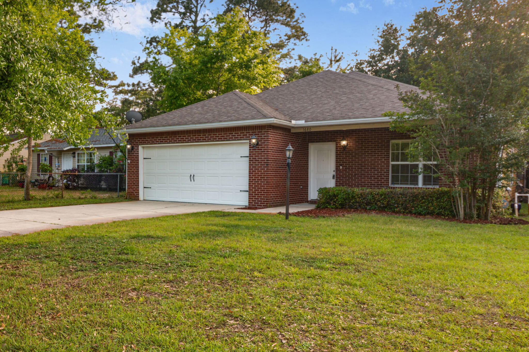Located in the heart of Niceville, this lovely home with 3 Bedrooms & 2 Full Baths is ready for you! The spacious family room boasts vaulted ceilings and plenty of natural light. The kitchen area is adorned with luxurious granite countertops, custom cabinets, newer stainless appliances, and a perfect bar top for entertaining. The master bedroom features an en-suite bathroom, accompanying double sinks, shower/tub combination, and a walk-in closet! The additional 2 bedrooms are generously sized and share a 2nd full bath. Enjoy the outdoors w/ a SCREEENED IN PORCH & large shaded/irrigated fenced in backyard! The concrete back patio provides the perfect space for hosting guests, or even a future hot tub! Close to Eglin/Duke/7th SFG along with fantastic restaurants & shopping nearby!