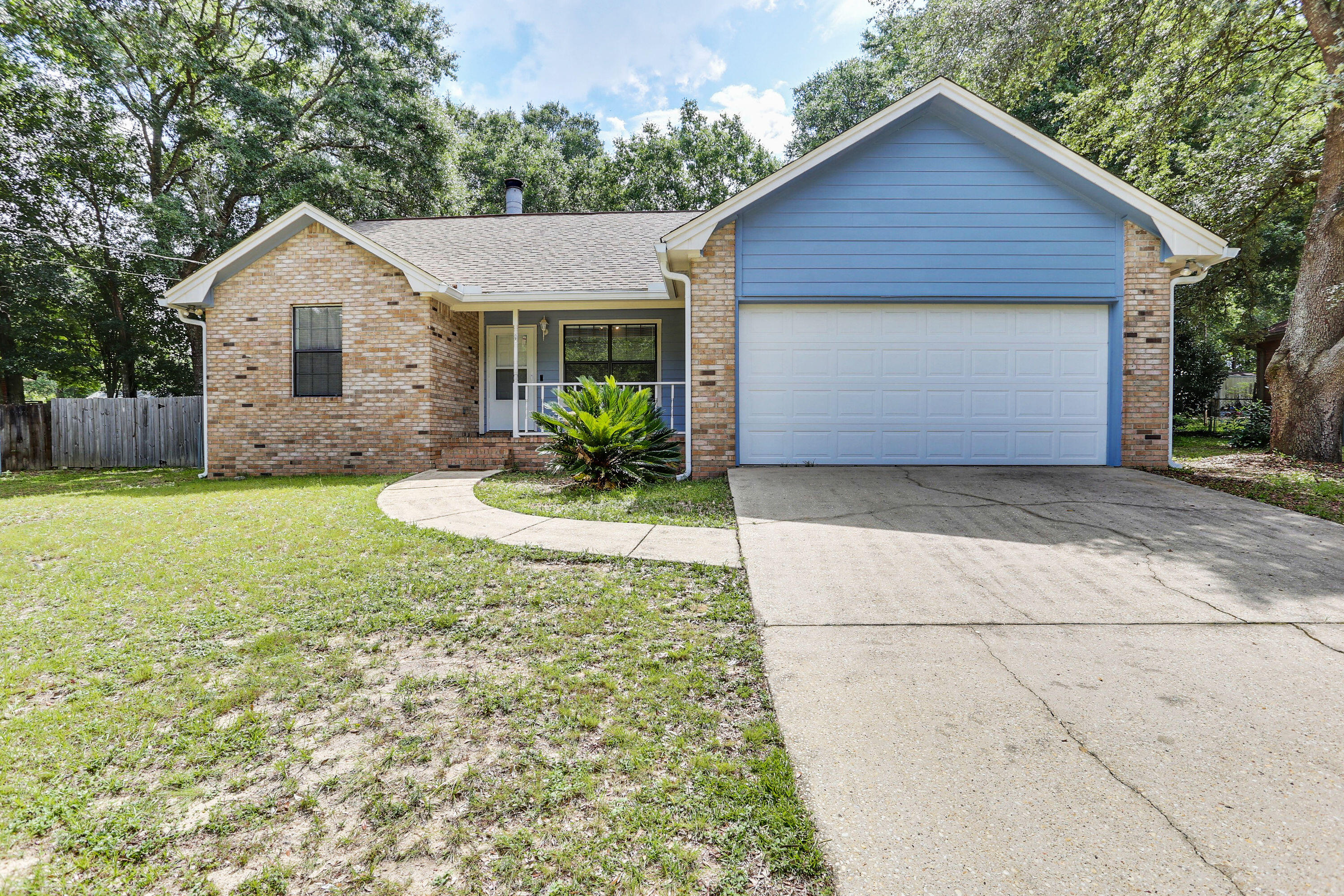 Here is an opportunity to live in the sought after Indian Trails subdivision. This 3 bedroom/2bath/2car garage home includes 24x30 workshop with large rollup door and 220 power with 30 and 50amp outlets. The home welcomes friends and family alike with a cathedral wood beam ceiling in the family room accented with a wood burning fireplace with access to a covered rear porch. The home has been recently painted and laminate flooring added throughout. The master suite features jetted garden tub, separate shower, dual vanities and 2 walk-in closets. The additional bedrooms are nice sized with ample closet space. The seller will replace the roof with a new dimensional shingle roof prior to closing with an acceptable offer. Schedule your private showing today!