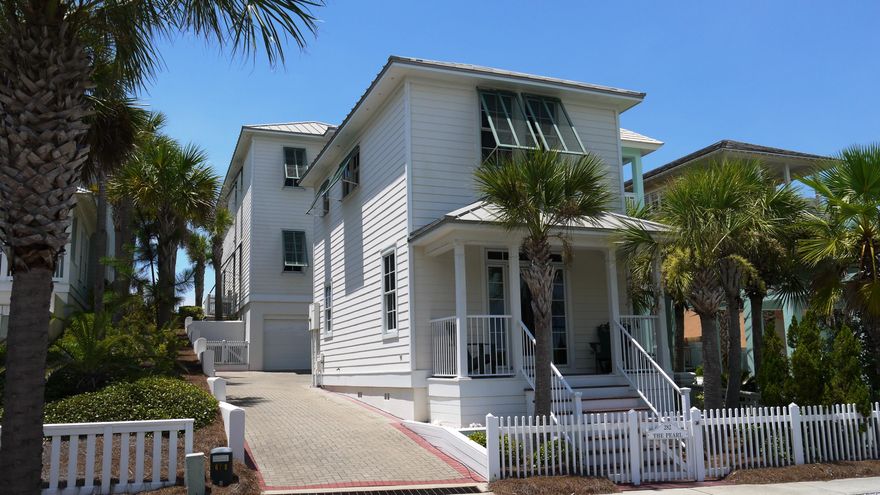 ''The Pearl'' is Gulf front home with main house and guest house is perfect for an active family, a rental property, or a permanent home. The home has just been totally redecorated and is ready to move in. It will fit your every need and afford you the luxury of a view of our spectacular white sand and aquamarine water. The main house has a ground level covered entry and garage; the second level has living (with fireplace), dining, kitchen, bedroom and bath; and the third level has a large master suite with fireplace, laundry room, guest bedroom and bath. All bedrooms have private covered porches with views. The guest house has 2 bedrooms, 2 baths, living, kitchen and laundry room. Home is being sold furnished with a small exclusion list.