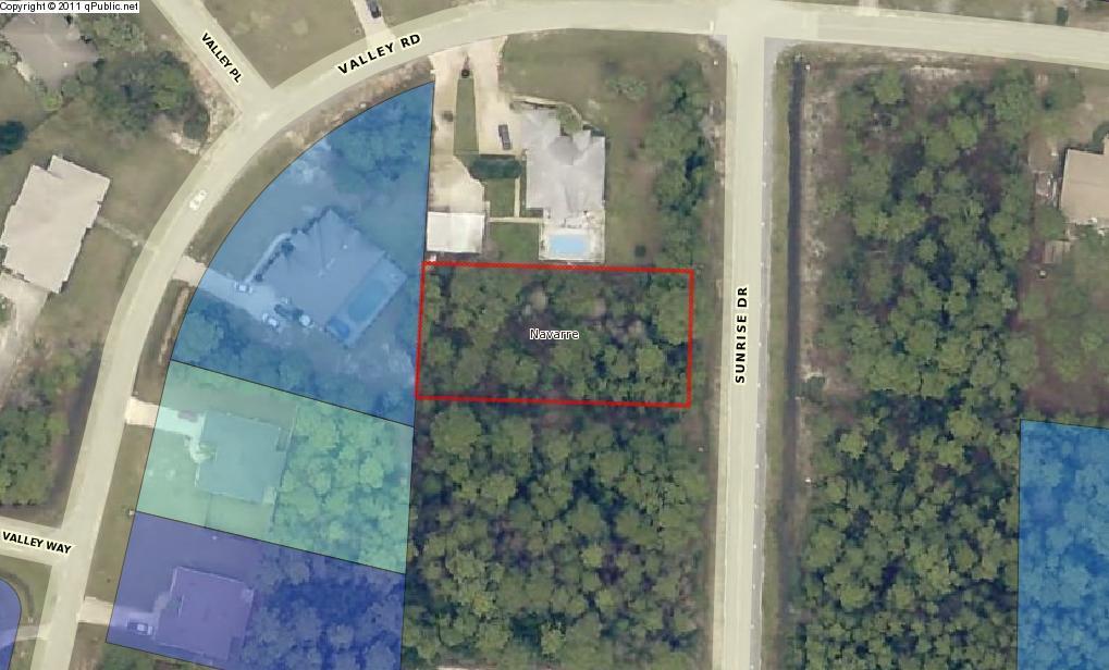 Large lot on almost half an acre where you can build your dream home! Holley By The Sea offers a massive recreational center which features a gym, basketball court, volleyball court, tennis court, baseball field, pools, and much more. The stunning beaches of Navarre are a short drive away as well.