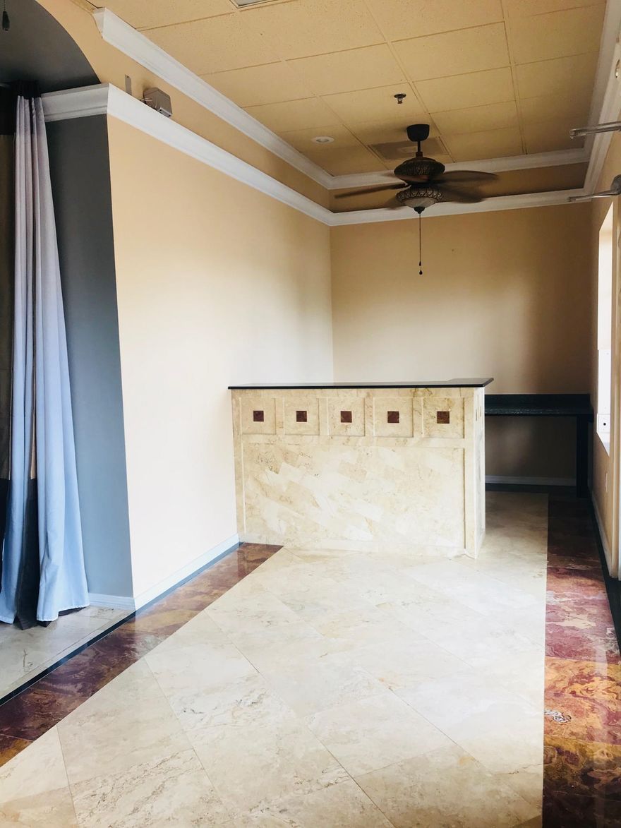 Check out this office space in the perfect location in Destin right off HWY 98. Walk into the office foyer, tiled with beautiful travertine tile, you are welcomed to a receptionist desk with built in storage. And in through the hall to the office spaces, on the left, you will find a small enclosed office with storage. Cubicle spaces line the rest of the left side of the wall. Opposite the cubicle spaces are 3 full size enclosed office spaces & another larger, enclosed conference room/office with tray ceilings, hardwood floors, & French doors that lead to the back of the building. Tile & cherry hardwood floors line 1500sq' office space with, high ceilings, crown molding, office built-ins, kitchenette, full bathroom & conference room. Seller is willing to owner finance with the right terms.