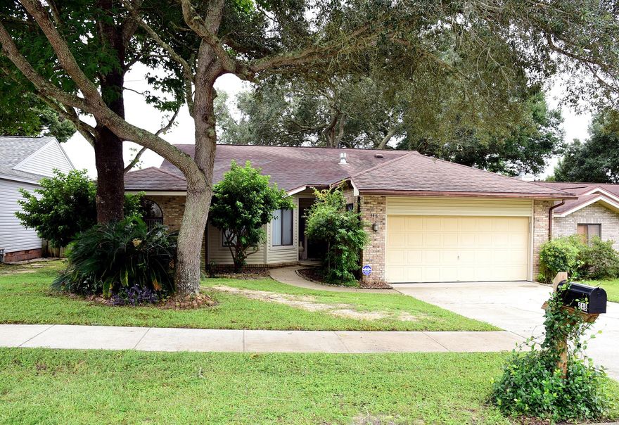 Welcome to 348 Evergreen Avenue in the heart of Niceville, FL. This charming home features 3 bedrooms and 2 bathrooms, perfect for those seeking a cozy yet spacious living space. The gas stove in the kitchen is a chef's dream, while the double vanity in the bathroom adds a touch of luxury. Enjoy the natural light streaming in through the skylights in the large great room, or relax in the screened sunroom overlooking the privacy fenced backyard. The central location of this home makes it convenient to access all that Niceville has to offer. Don't miss the breakfast nook, perfect for enjoying your morning coffee or a quick meal. Make 348 Evergreen Avenue your new home sweet home.