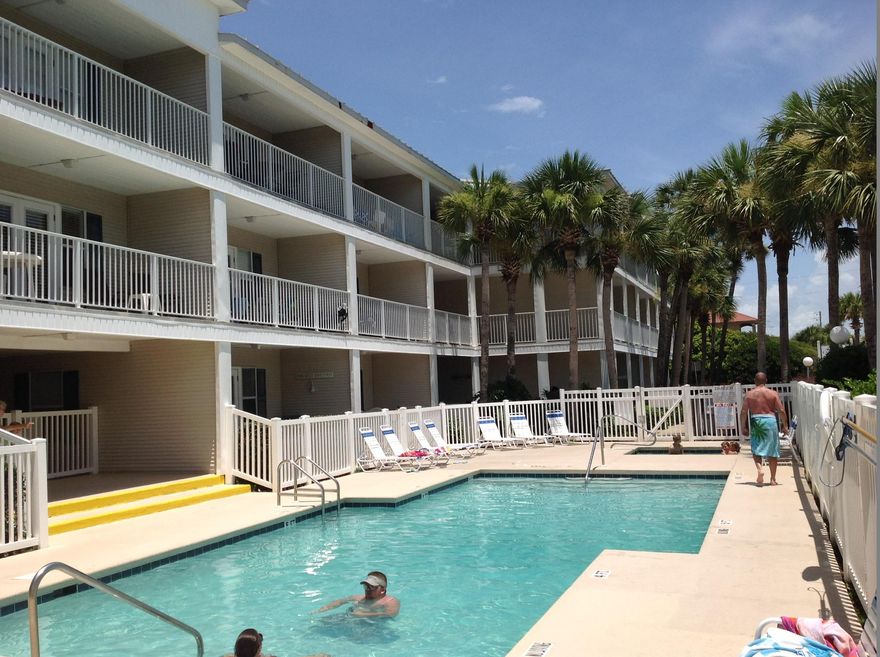 ***JUST PAINTED ENTIRE UNIT!***This gorgeous 2 BR 2 bath condo has a breathtaking view of the Gulf and is just steps from public beach access. The unit has been completely renovated and has a large kitchen and living room with tiled floor throughout and carpet in the two bedrooms. Futon will pull out to a full size bed and there is a ''plug in'' blow up Beautyrest queen bed in closet making the condo sleep 8! Grand Caribbean East has a private heated pool and hot tub.