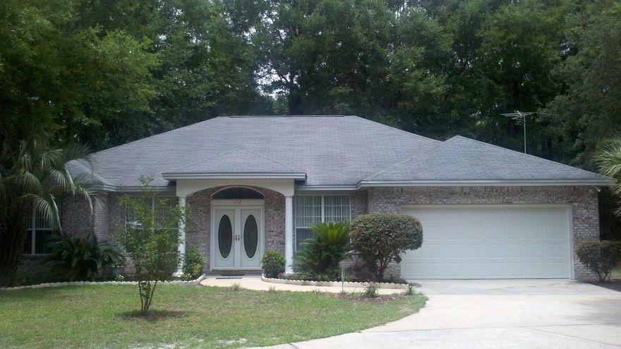 GATED WATERFRONT ESTATE with ACREAGE on CAMP CREEK off Black Creek. Scenic Boardwalk takes you to a peaceful escape on Camp Creek. Beautiful brick home features 4Br/3a, higher ceilings, open living space w/split bedroom plan, formal Dining Room, Office & FL Room. Large Kitchen has Breakfast Bar, dining area, pantry & Island. Built-in Bookcases & Fireplace for a cozy setting in the Great Room. Unique window view of Creek in Master BR. Security system w/cameras. Home has one guest suite w/private entrance. Garage has Laundry sink, Washer & Dryer hook-up & pull-down attic stairs. Detached garage building is a great workshop plus has additional storage - could easily be converted to guest quarters. Summer Kitchen/Greenhouse is a Bonus for enjoying the outdoors! Outstanding Home - Call to See!