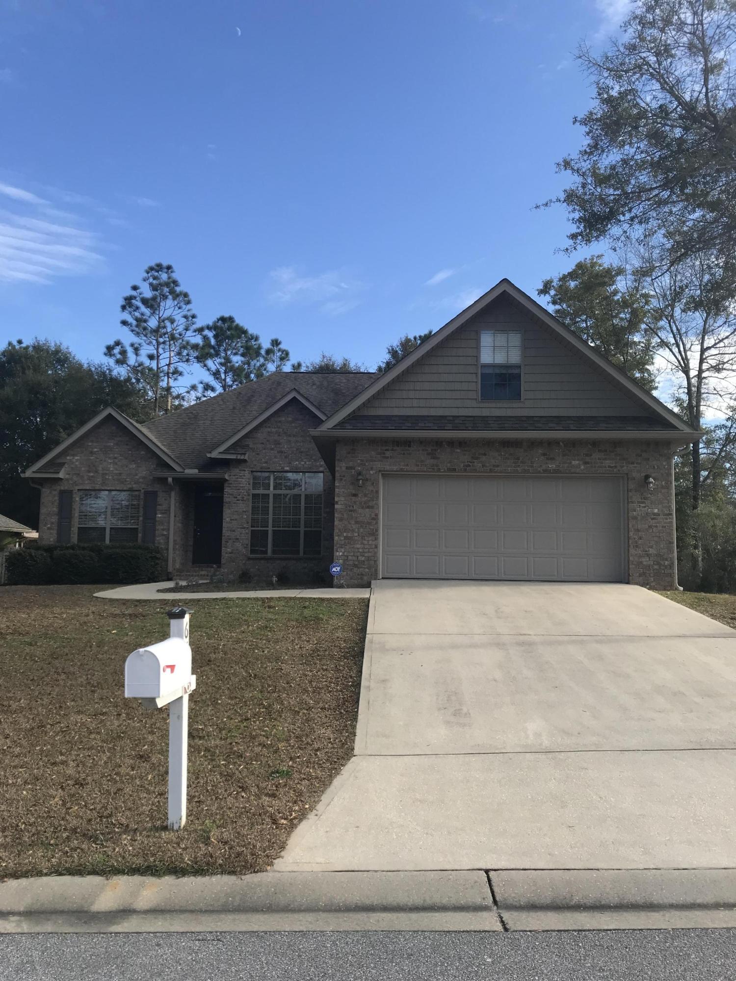 Beautiful all brick home south of Interstate 10. This 4 bedroom, 2.5 bath home includes an office. Kitchen has stainless steel appliances, breakfast bar, pantry and a kitchen island. Split bedroom floor plan. The master bedroom has trey ceilings and a walk in closet. The master bath has a double vanity, garden tub and a separate shower. There is also a screened in porch and a privacy fenced in back yard. Convenient to neighborhood playground,picnic area, military bases, shopping, schools and dining.