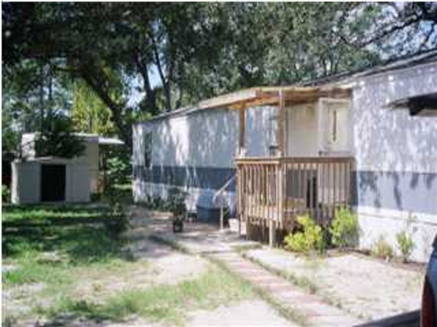 Nicely remodeled trailer. Ceramic tile throughout the living areas and baths and Berber carpet in the bedrooms. The yard has stepping stones to the front porch.No pets allowed at this property. Hurricane Michael Rental available.
