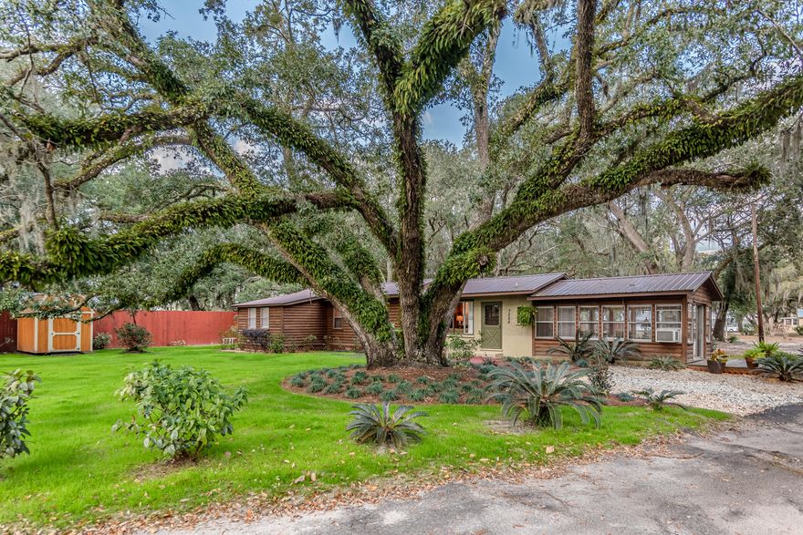 Looking for that survivalist camp...look no further!  Nearly 2 acres of the prettiest piece of property you have ever laid eyes on.  Two remodeled homes, move-in ready, on 172 Ft. of waterfront on Basin Bayou with a boat dock built in 2017.  Walking distance to Nick's Seafood.  Boat passage to the Bay at the low-water bridge at Nick's Seafood. Fish in Bayou Bayou for saltwater, or freshwater fish.  Take your boat up river into Basin River to fish for large-mouth bass.   Enjoy this rare 'Ole Florida feeling improved property with mature, moss-covered Live Oaks, Camellias, Crepe Myrtles, Magnolias, Hydrangeas and fruit trees. Property is irrigated with 4 wells.  If you love to garden there is a lovely irrigated garden spot ready to plant that early Spring garden.  The one bedroom yellow bungalow close to the water's edge, but high and dry, was built in 1943 and remodeled in 2017 from top to bottom with new interiors, exterior siding and new metal roof.  The main house clad in split-log siding was built in 1953, and renovated completely in 2020 including leveling floors, new stainless screws in metal roof, replacing well pump, replacing and adding irrigation around property, moving AC ductwork from underneath the home to the attic, adding can lighting, painting, staining hardwood floors, gutting kitchen, removing wall, adding new cabinets, flooring, appliances, changing plumbing....and the list goes on.  See complete list of improvements in documents. These two vintage cottages are not the only buildings to get a total face-lift.  Shed converted to a five star hotel for chickens, fondly referred to as "Coopa Cabana".  Six laying hens convey with property or they the ladies can be rehomed. They have a fully remodeled interior home with nesting boxes and two outside runs.  One end of the shed "Feed & Seed" is used as a workshop with newly added electricity, and power pole.  In addition there is a separate potting shed on the property and two fairly new storage barns, tool shed and a carport near the yellow bungalow.  This property would make a fine permanent living home with guest house, or two rental properties.  You will  see the most amazing sunsets setting at the campfire on Basin Bayou.  The view will never changes across the bayou as Eglin Air Force owns most of the property around Basin Bayou.  Sit on your dock and watch the Osprey soar and the fish jump. Kick back and relax for this property has it all....water, fish, chickens, eggs, garden space and plenty of fresh air!