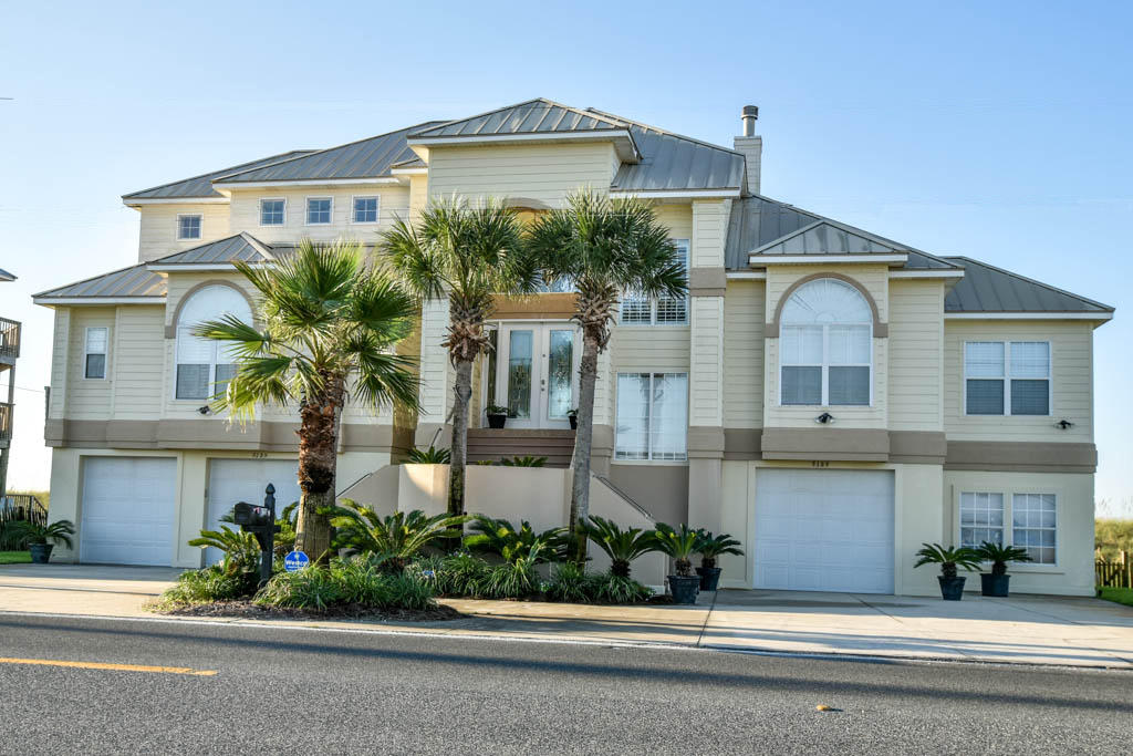 100' of Gulf Frontage in Navarre Beach. Located between Pensacola Beach & Destin on Florida's Beautiful Emerald Coast. This 4 BR/3.5 BA home is the ultimate beach house. Grand entry & living room w/20+ foot ceilings & views of the beach from the moment you walk through the front door. Open floor plan & lots of outdoor space make this home perfect for entertaining guests. The homes 3 levels are easily accessible via an elevator. The master suite encompasses the entire 3rd floor with a large master closet, private bath with whirlpool tub, large shower & fireplace. Other features include whole home audio system w/outdoor speakers, intercom system, custom fixtures, motorized and manual hurricane shutters, & landscape lighting. Escape the crowds and have lots of room to spread out on the beach.