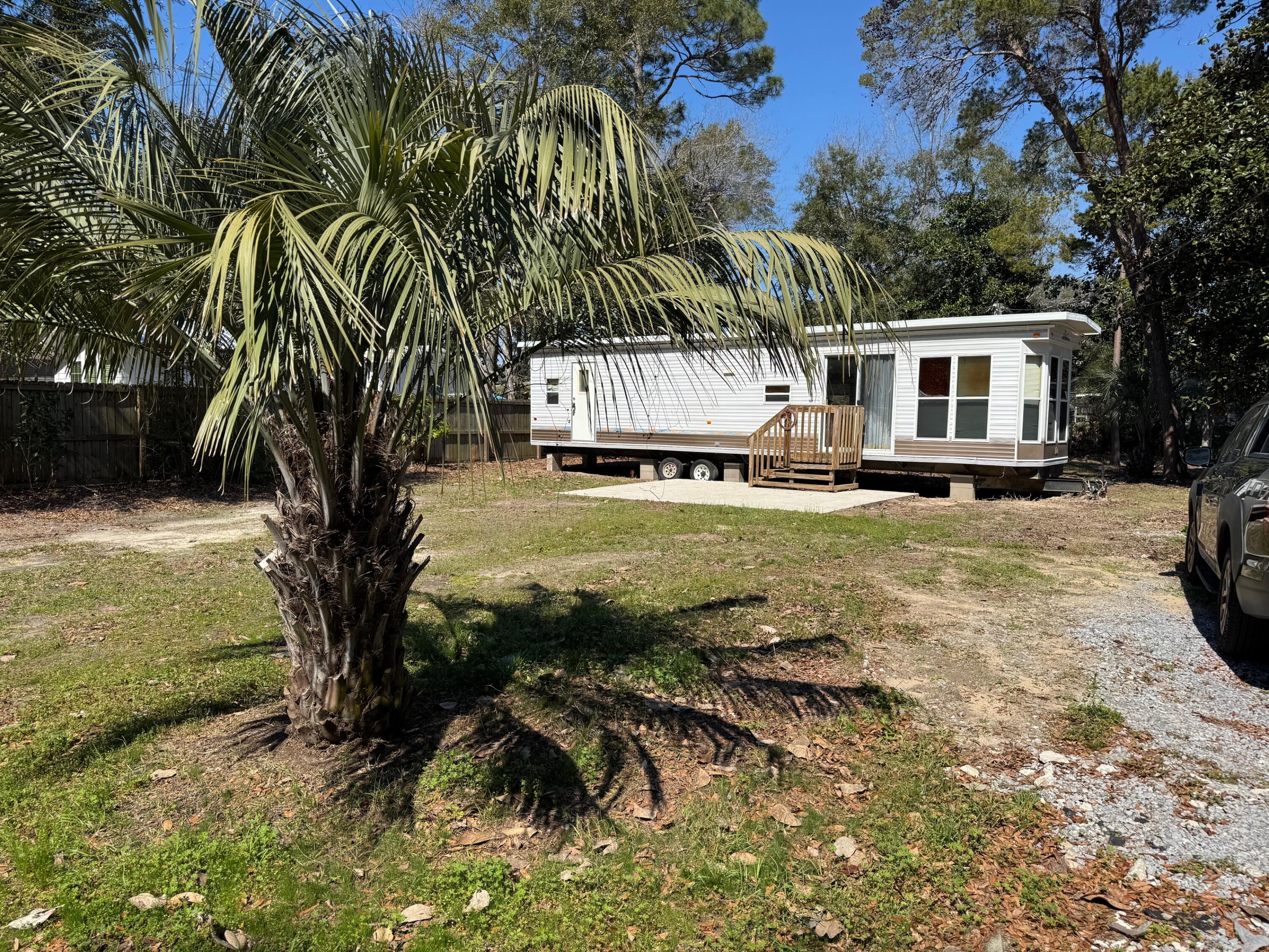 RV-Ready Property Near the Emerald Coast - Fisherman's Paradise!Looking for the perfect getaway spot near the beach and the water? This RV-ready property in the sought-after Black Creek area, just off McDaniel Fish Camp Road, is the ideal setup for outdoor enthusiasts!Property Features: Two RV setups - Bring your home on wheels or rent out a spot! Pole barn - Perfect for parking your boat or extra storage. Outdoor shed - Includes washer/dryer hookups for added convenience. Prime location - Just 1/2 mile from a boat launch, making it easy to get on the water. Close to the beach - Only 12 minutes to the stunning Emerald Coast with its white sandy shores. Insurance Flood Zone X , Rural VillageBonus: there is a 42 foot camper ins ...(mostly a new floor covering, more cleaning, and some minor repairs) that is planned. The asking price is based on this work being done. Buy it As Is, finish the work yourself and save some cash! Whether you want to hit the beach, go fishing, or simply relax, this property is your gateway to the good life.
Call today to schedule a viewing!