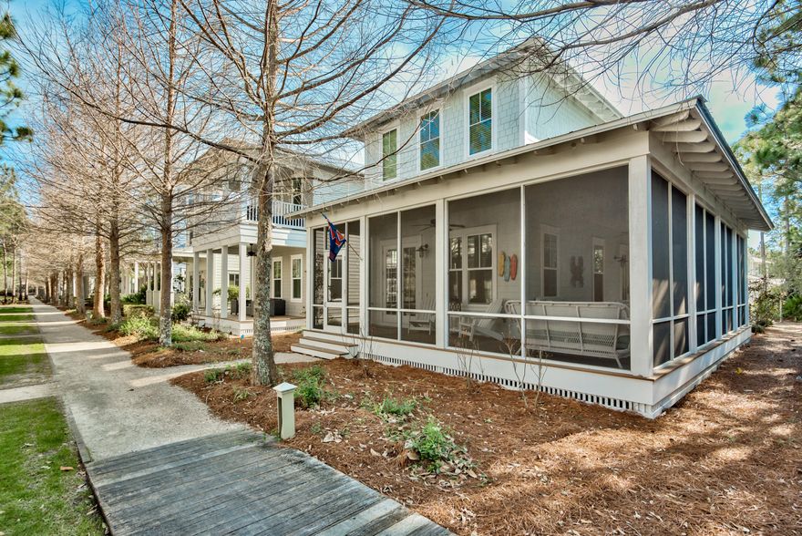Discover an unforgettable retreat with an easy, comfortable flow of space in this turnkey 4 bedroom, plus bunkroom, 4.5 bath home. Nestled in WaterColor Phase IV on a quiet street that backs up to park land, this stylish property boasts a large wrap around screened porch, warm hardwood flooring, high ceilings, lots of natural light and beautiful wood wainscoting, all creating a timeless and inviting residence. The open floor plan includes a chef's kitchen with stainless steel appliances, granite counters, subway tile backsplash, and center island with breakfast bar. Two master suites, second story loft, roomy guestrooms and bunk room make this an ideal getaway for family and friends. Conveniently located near top amenities, such as WaterColor Beach Club, parks, nature trails