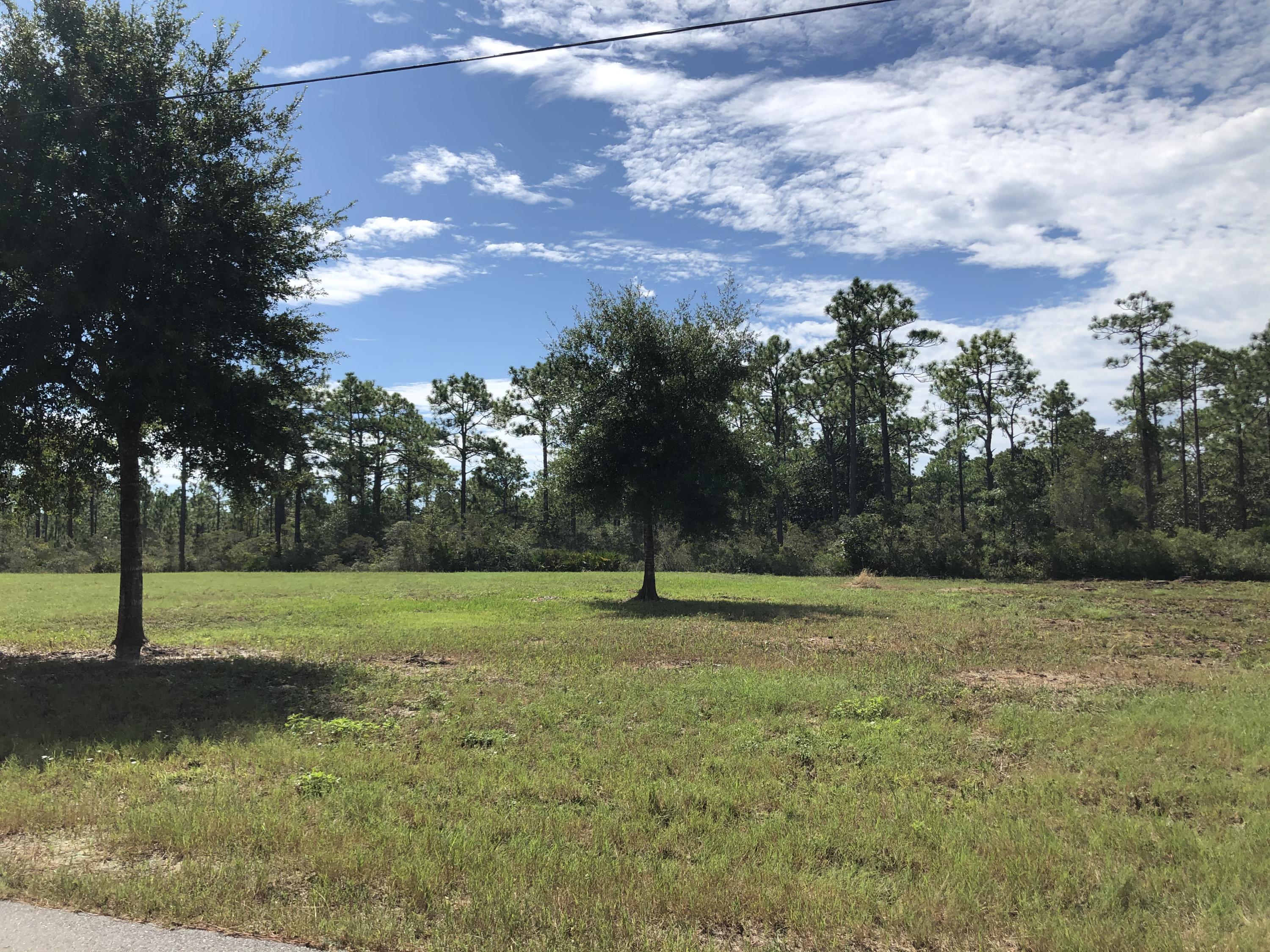 Where can you find 4 lots with access to the bay and NO HOA ? Right here on Blue Bell Circle. These parcels -totaling over 1.1 acres - would make a wonderful estate property (360 x 135) or 4 separate single (90 x 135) family homes. If you are a boater, you'll immediately enjoy the ability to launch your boat using the community boat launch and being just a short boat ride to the bay. Convenient to the restaurants, shops and entertainment of Grand Boulevard and the services of Ascension Sacred Heart Hospital you will surely see these are prime building lots. Dimensions are deemed accurate, but if important should be verified by buyer.